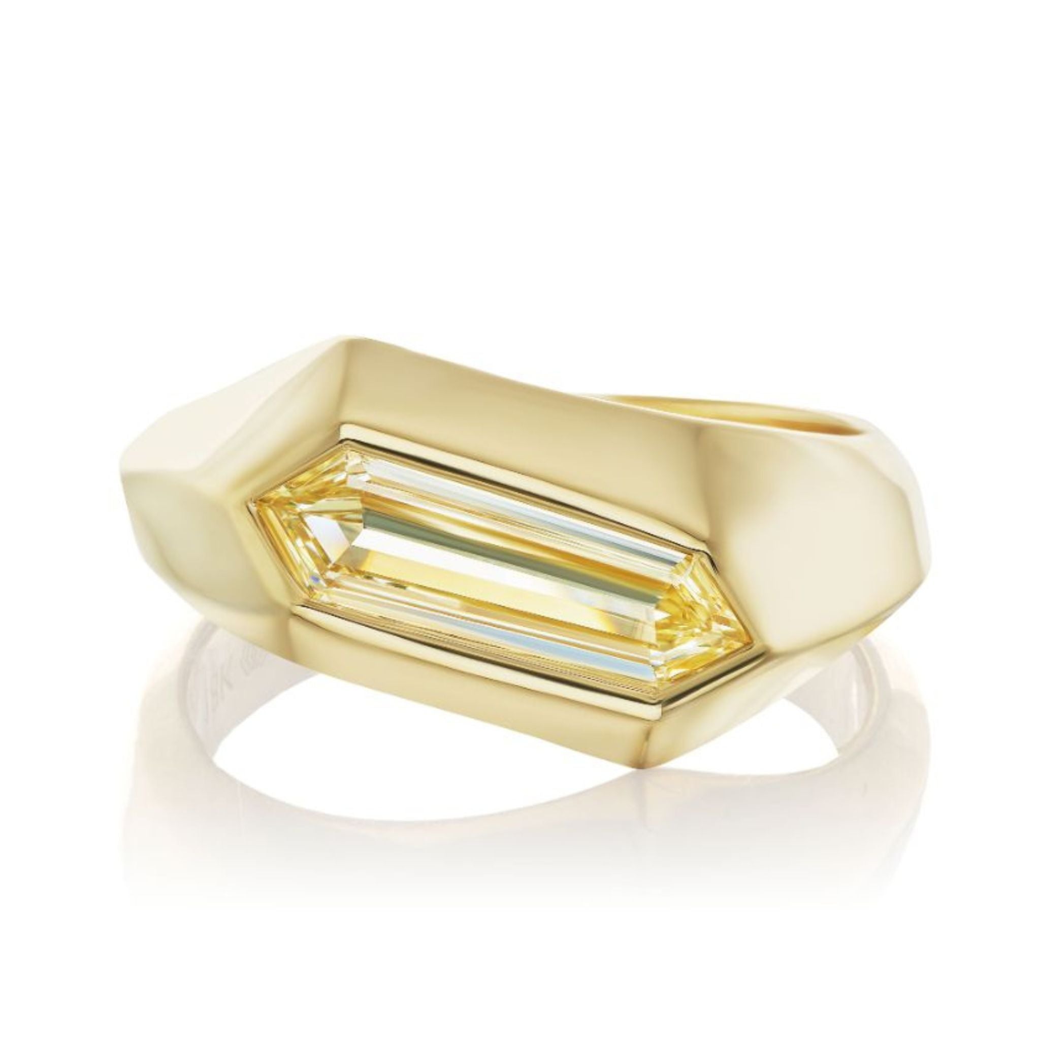 The Chunky Hexagonal Ring in Yellow Gold features a large, elongated fancy light yellow diamond set in a modern 18K yellow gold bezel with smooth, clean lines.