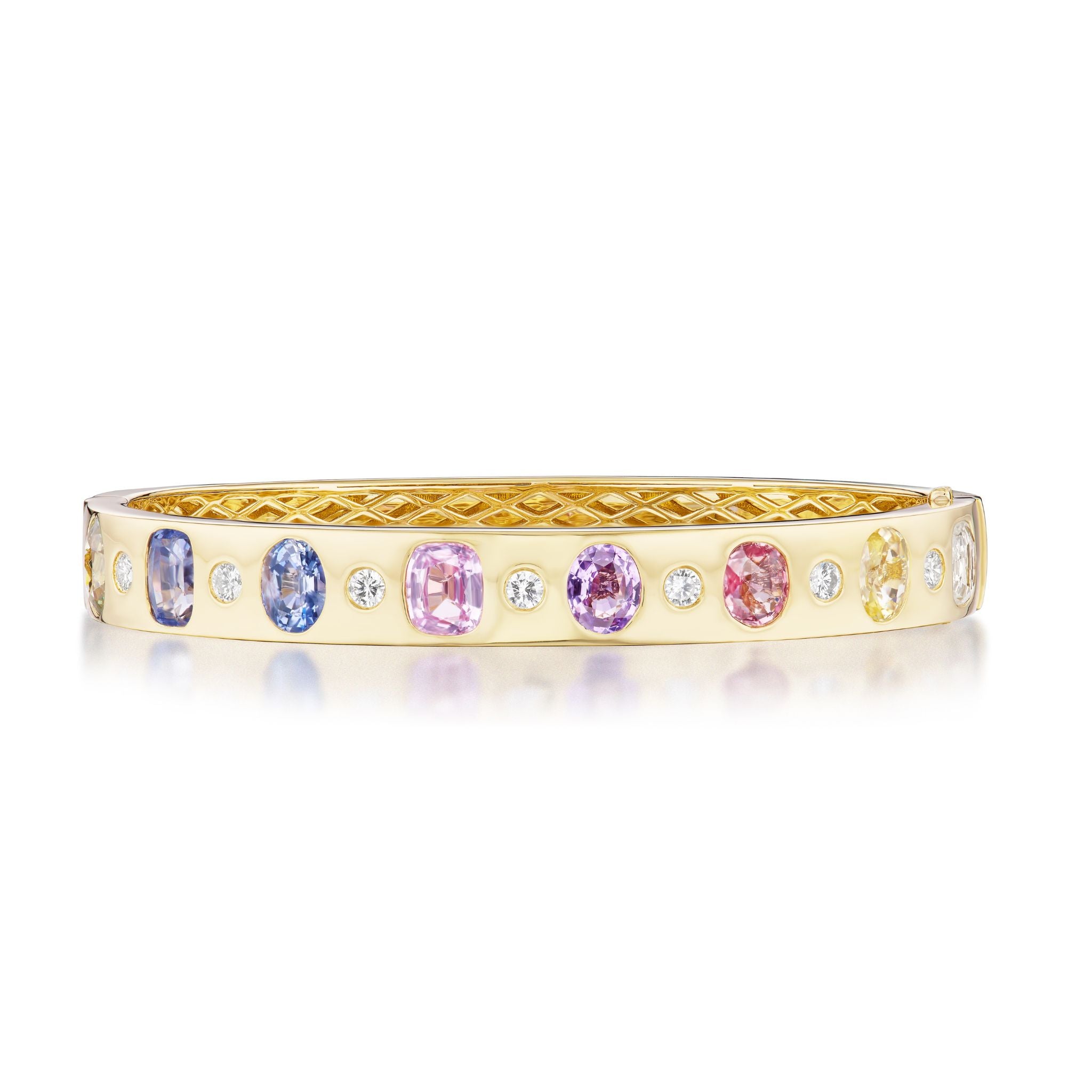 A Burnish Set Multicolor, Mixed Shape, Diamond and Sapphire Bangle in Yellow Gold featuring oval-cut pastel gemstones and round diamonds arranged in a repeating pattern with sparkling oval-cut sapphires, displayed on a white background.