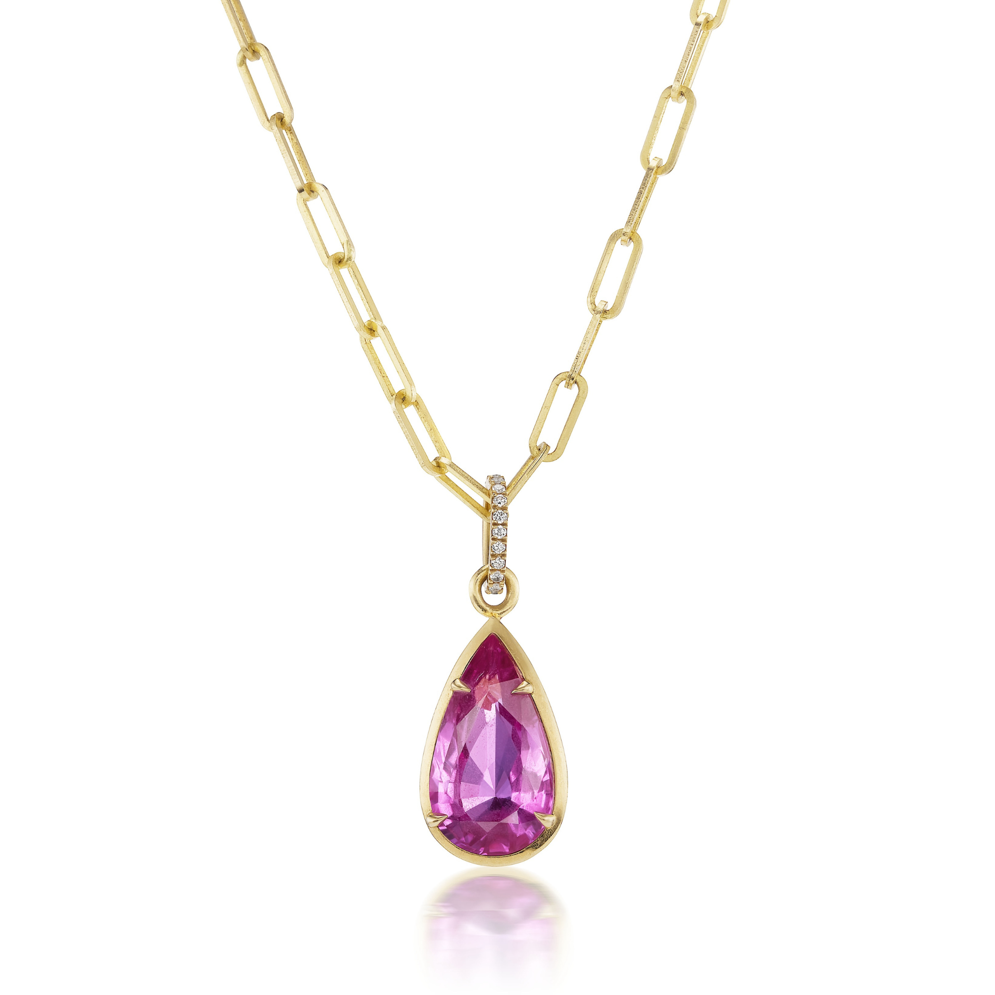 The Collet Set Pear Shape Pink Sapphire Pendant Chain Necklace in Yellow Gold features a gold chain with elongated links and a pear-shaped pink sapphire pendant accented by diamonds on the bail.