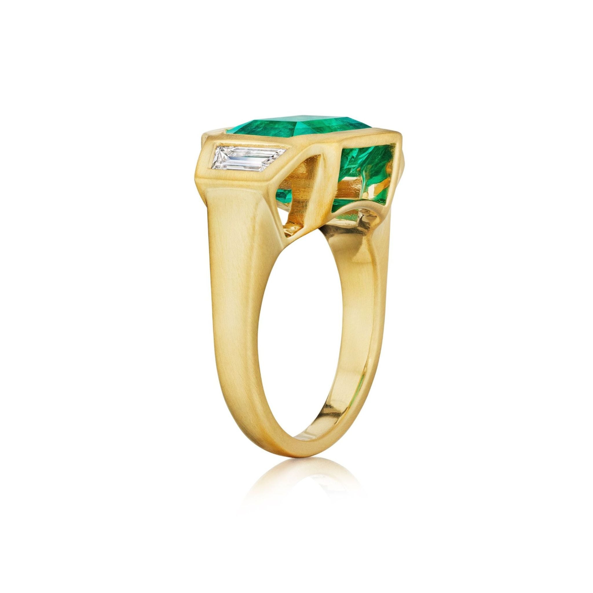 Bezel Set East-West Emerald Cut Emerald Three Stone Ring with Trapezoid Diamond Side Stones in Matte Yellow Gold