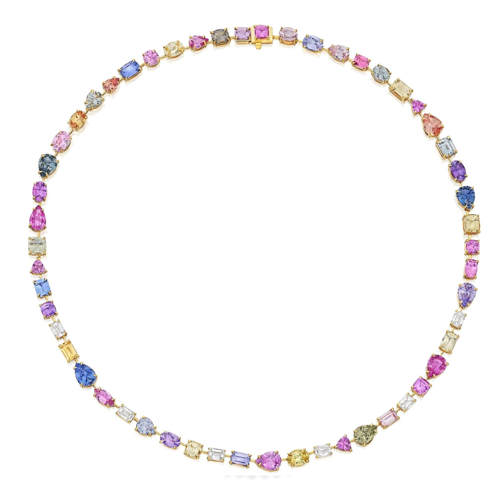 The Chroma Kaleidoscope Mixed Shape Sapphire and Diamond Tennis Necklace in Yellow Gold showcases a continuous serpentine loop of sapphires in pink, blue, yellow, and purple hues—each gemstone varying in shape and size—beautifully set alongside sparkling diamonds.