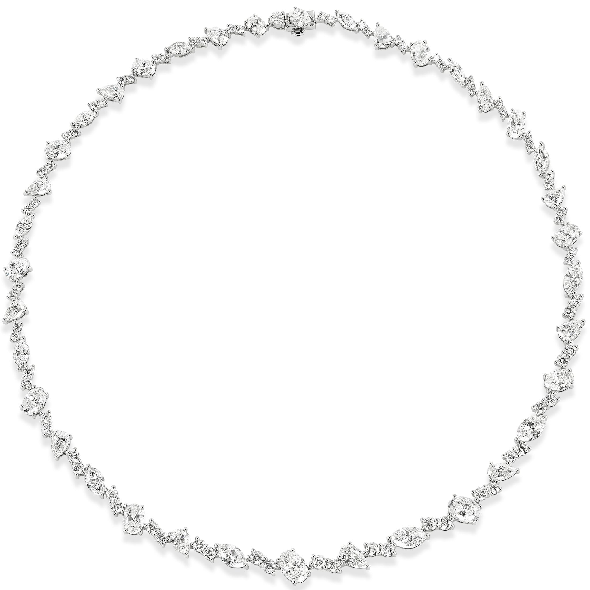 Introducing the Mixed Shape Diamond Tennis Necklace in White Gold: a refined necklace showcasing an alternating arrangement of uniquely shaped diamonds set along a slender 18K white gold chain, elegantly forming a continuous circle against a white background.