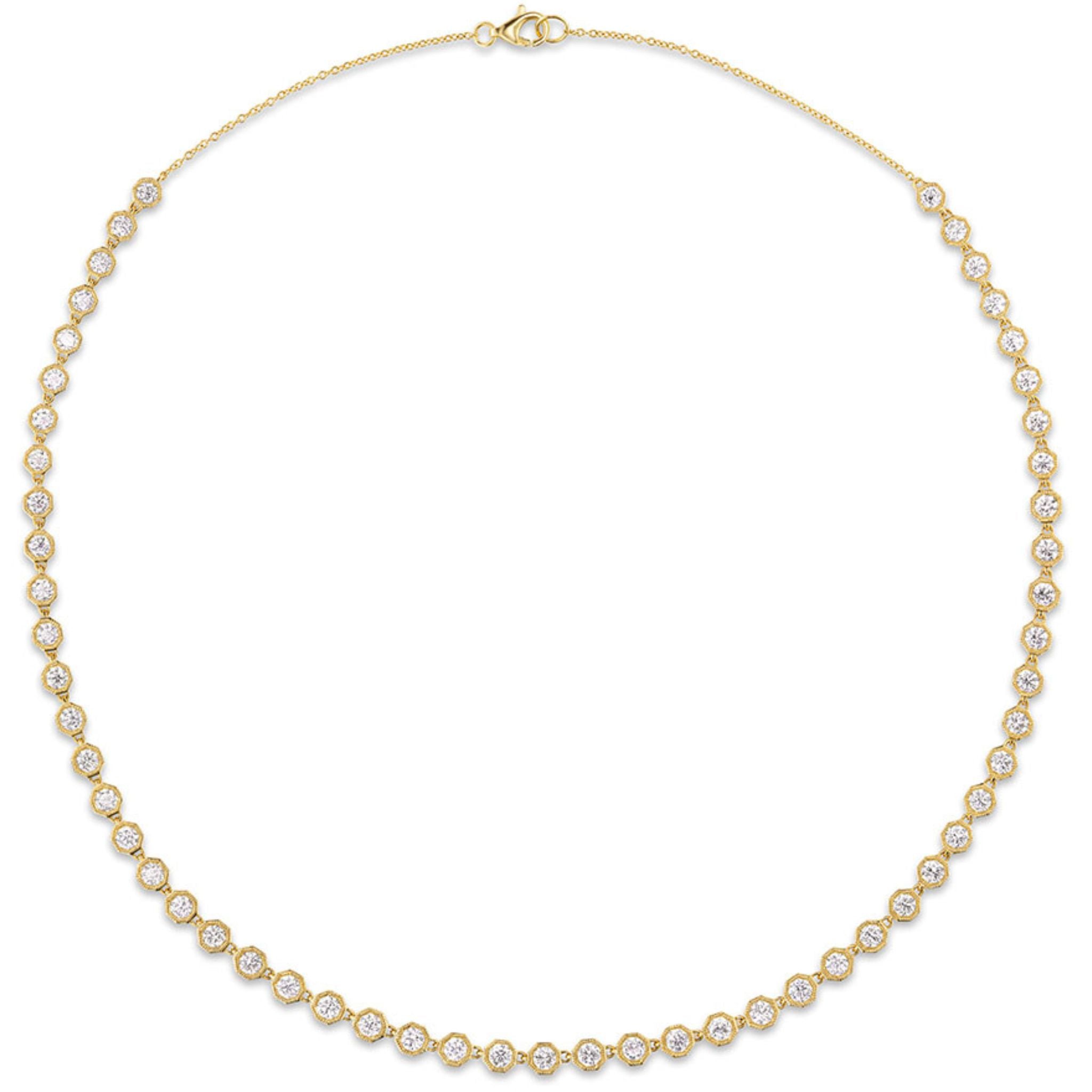 Octagonal Bezel Set Tennis Necklace with Round Diamonds crafted in 18k gold, featuring evenly spaced round brilliant diamonds of SI1 clarity in octagonal bezel settings that create a refined, symmetrical floral or star-like pattern. Finished elegantly with a lobster clasp.
