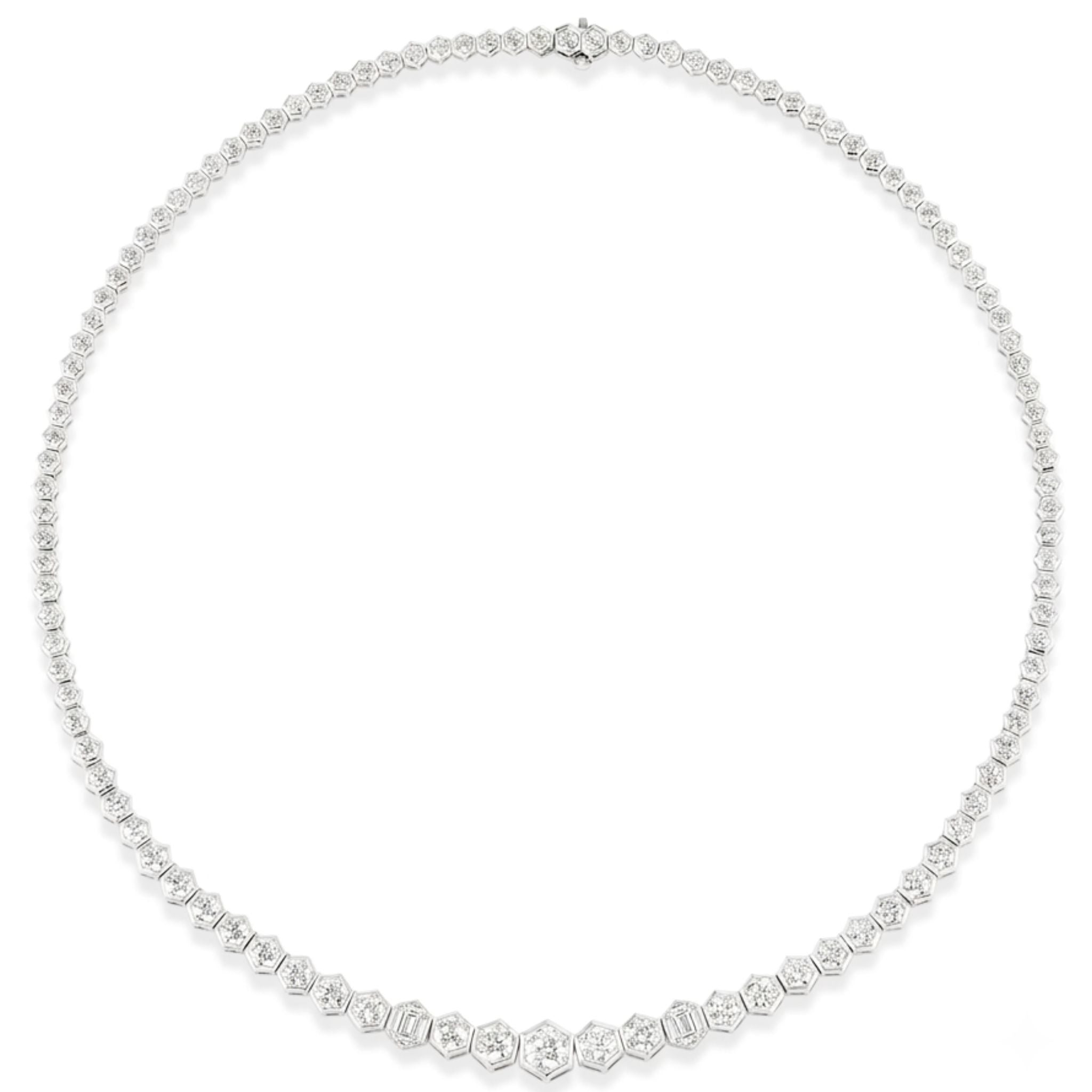 The Graduated Hexagon Bezel Set Round Diamond Tennis Necklace in White Gold is a refined, slender piece crafted from 18k white gold, featuring evenly spaced hexagonal bezels—each set with round brilliant cut diamonds—along its full 16-inch length, shown on a white background.