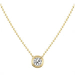 Introducing the Bezel Set Round Diamond Ball Chain Necklace in Yellow Gold, featuring a round diamond pendant elegantly set in a simple 18K yellow gold bezel.
