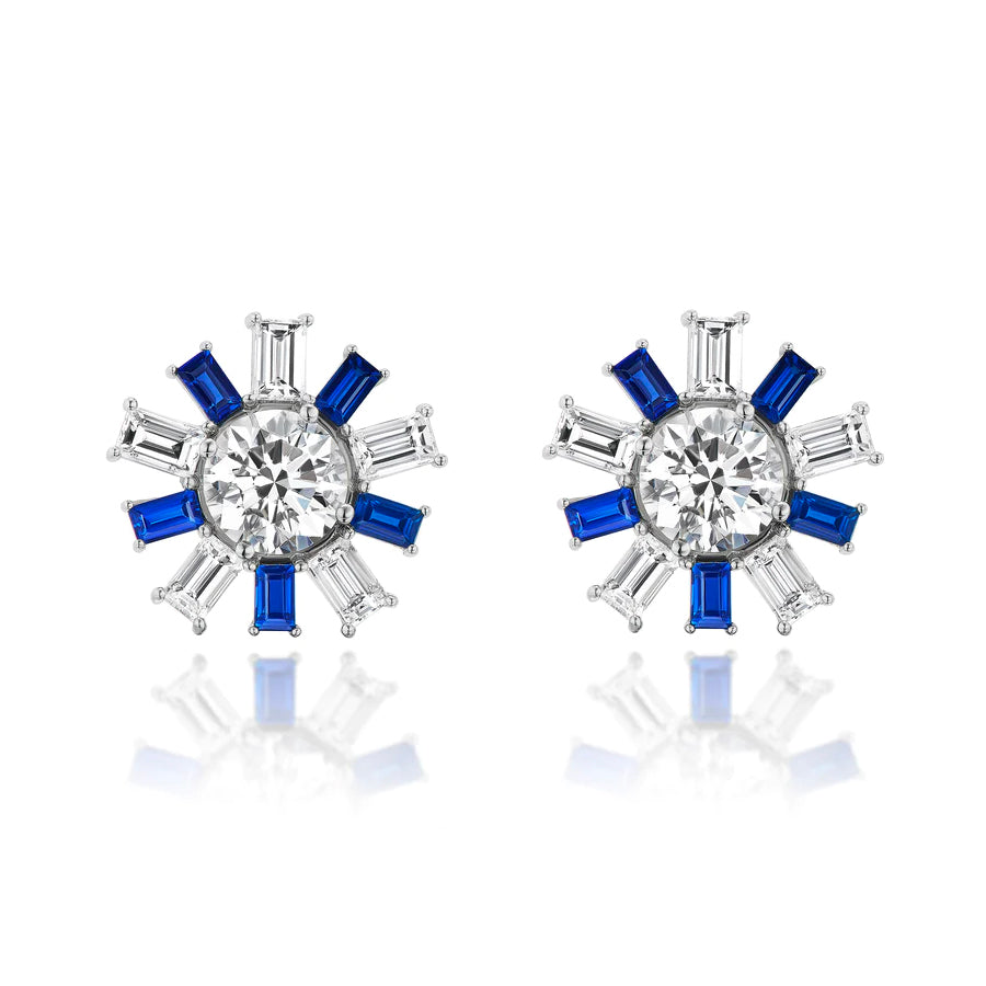 Confetti Ear Jackets in white gold, featuring central emerald cut diamonds with alternating sapphire and diamond accents in a sunburst design.