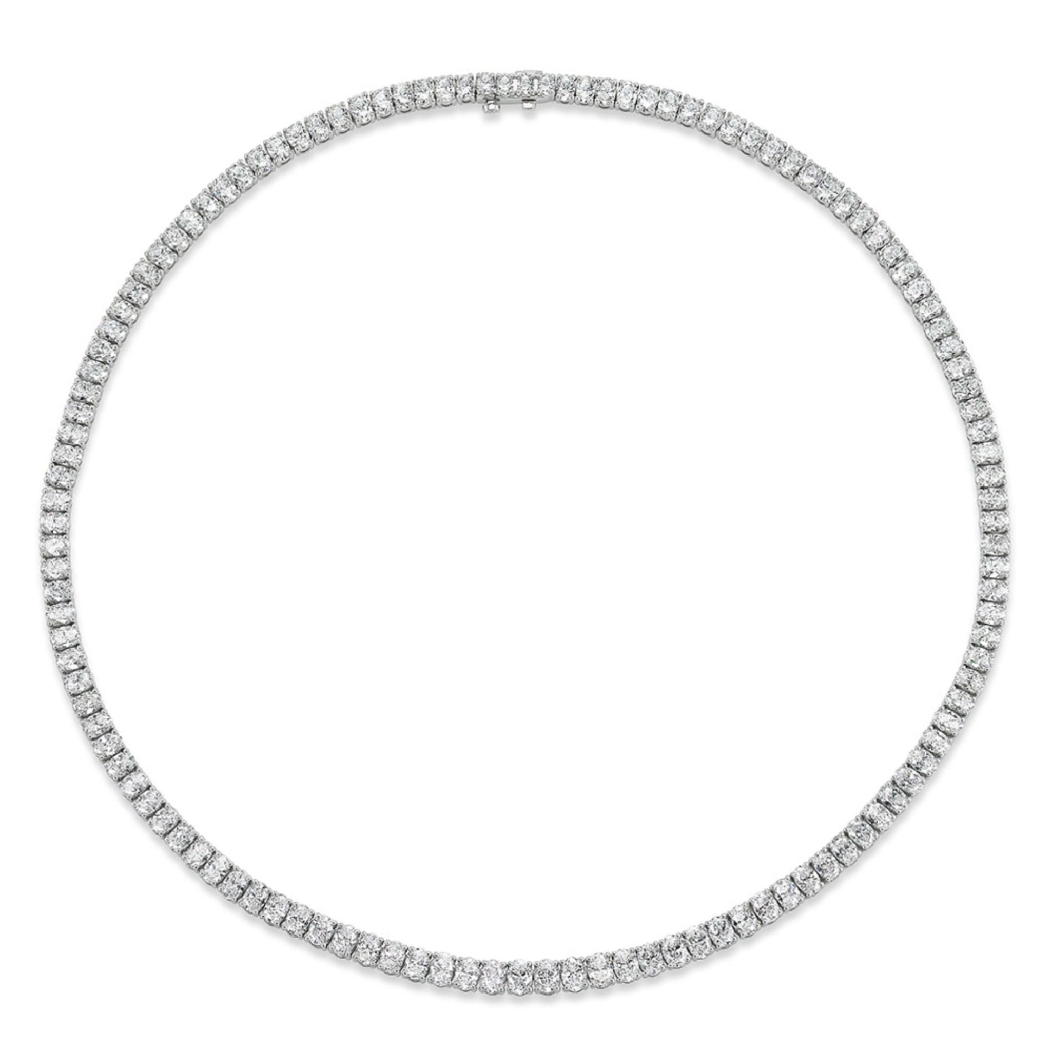 An oval diamond tennis necklace, featuring a continuous row of dazzling oval diamonds set in lustrous 18K white gold.