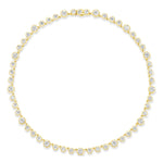 A Collet Set Round Diamond Graduated Tennis Necklace in Yellow Gold, featuring round diamonds set in 18k yellow gold with a graduated design for timeless elegance.