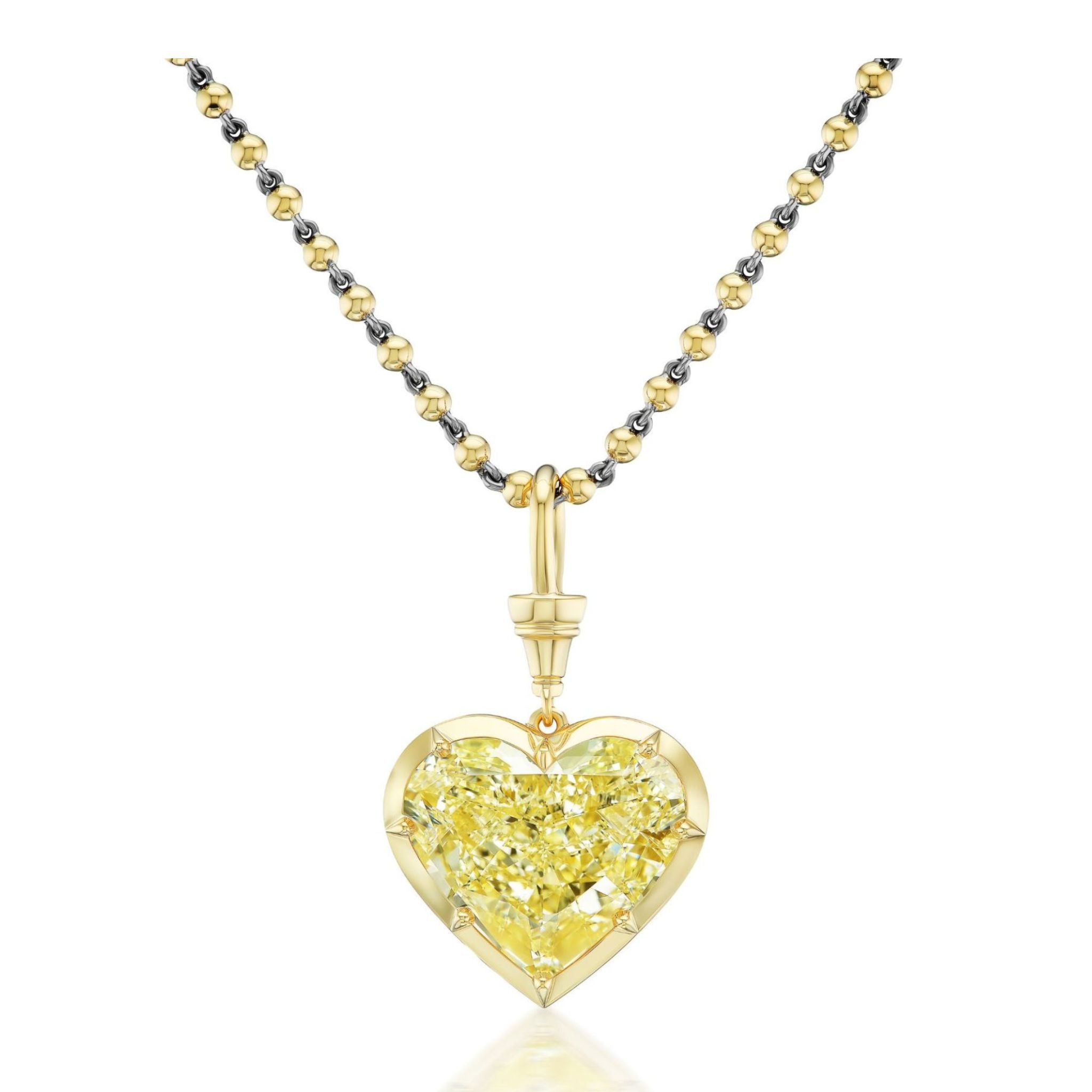 Introducing the Collet Set Heart Shape Fancy Yellow Diamond Necklace in Yellow Gold—a stunning piece featuring a heart-shaped fancy yellow diamond pendant set in luxurious 18k yellow gold, radiating exceptional brilliance reminiscent of GIA-certified gemstones.