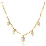 Introducing the Disco Necklace in Yellow Gold with Step Cut Pear Diamonds: an 18K yellow gold chain adorned with five evenly spaced, marquise-shaped step cut pear diamond pendants set in gold. Evoking the delicate look of a classic Disco Charm Necklace, the pear diamonds elegantly suspend from the chain, resulting in a sophisticated and graceful design showcased on a white background.