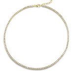A striking Large Adjustable Round Brilliant Diamond Tennis Necklace in Yellow Gold, featuring evenly set round brilliant diamonds along the chain with an adjustable clasp, elegantly displayed on a white background.