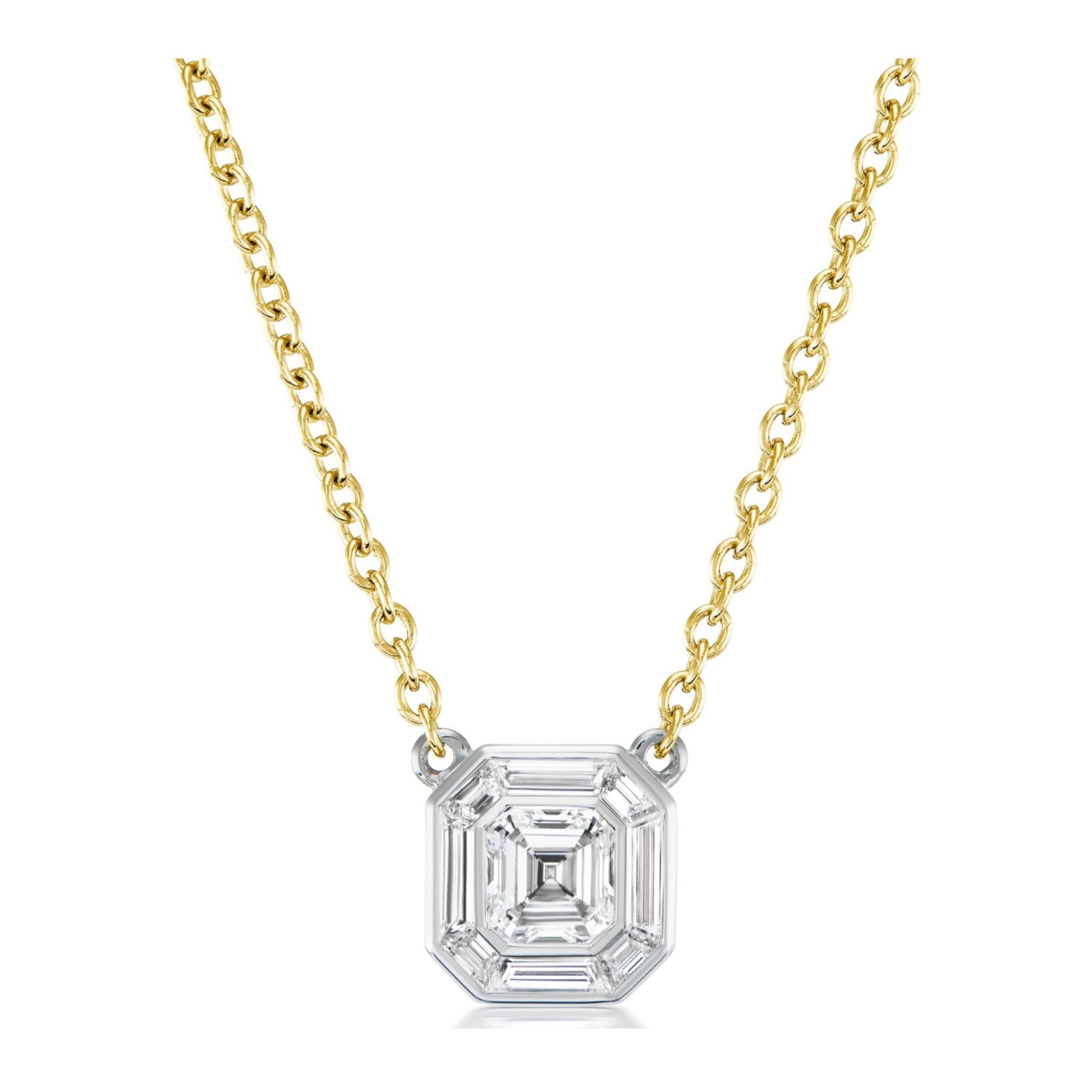 The Mosaic Pendant Necklace showcases an Asscher cut diamond set in a silver bezel, suspended from a yellow gold chain and accented with tapered baguette diamonds for extra brilliance.