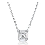 The Asscher Cut Diamond Mosaic Necklace in White Gold features a striking, large octagon-shaped clear gemstone with step-cut facets, reminiscent of an Asscher cut diamond, showcased on a white background.