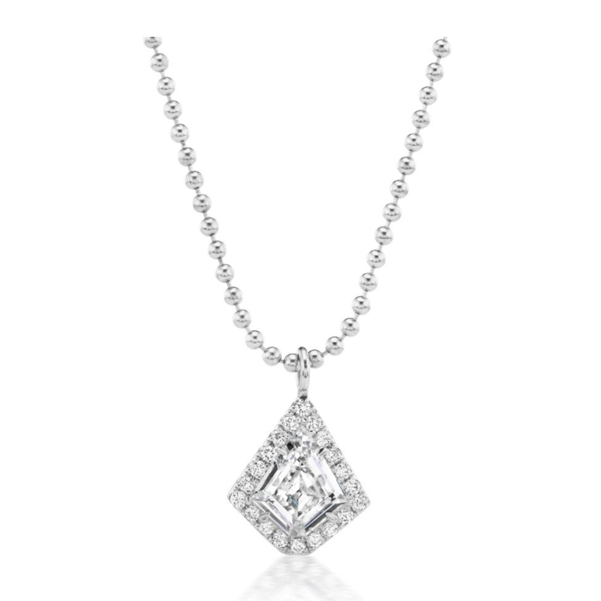 Introducing the Pavé Kite Diamond Solitaire Pendant in White Gold: a silver beaded chain necklace showcasing a striking kite-shaped diamond solitaire at its center, beautifully surrounded by pavé-set sparkling stones and crafted in luxurious 18K white gold.