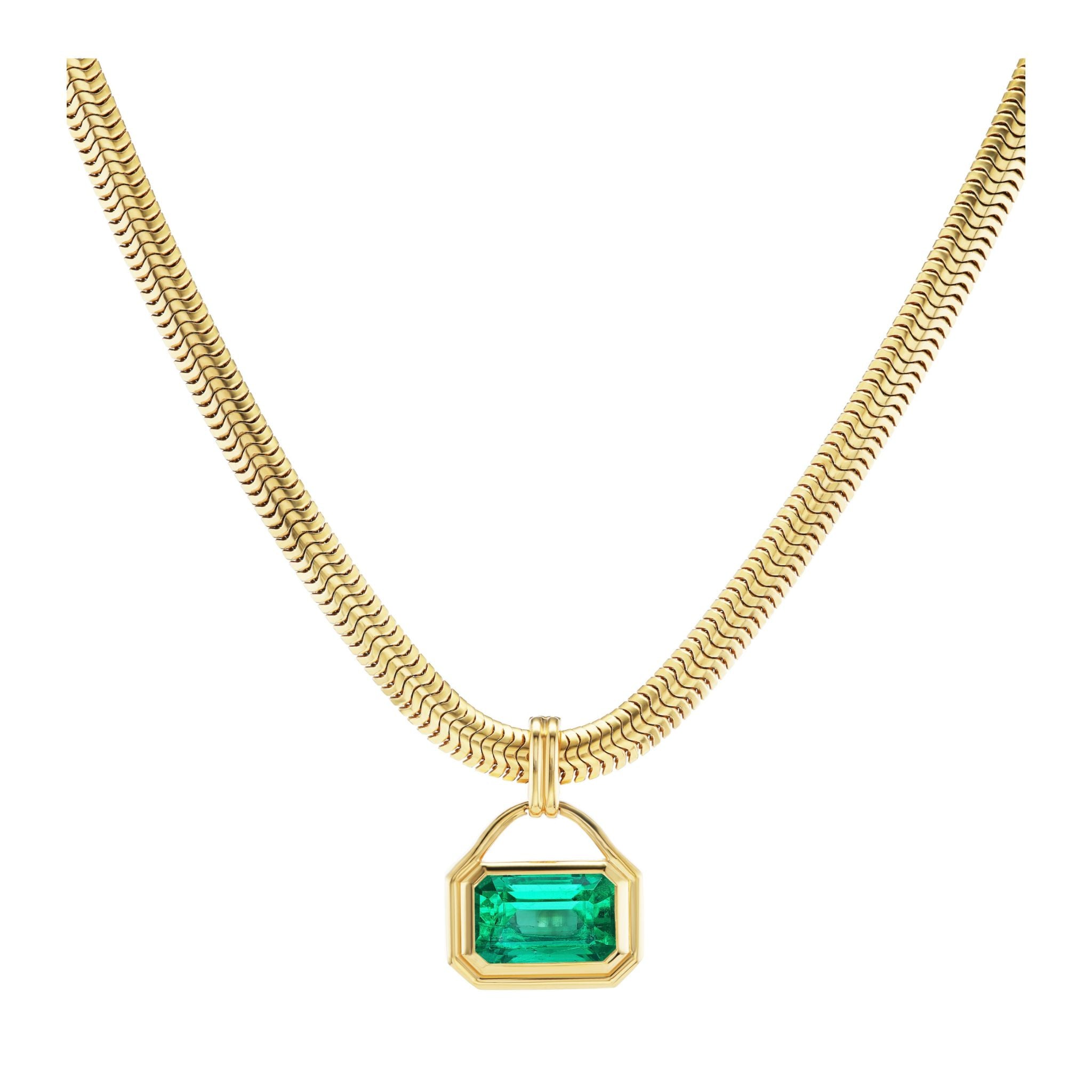 Bezel Set East-West Emerald Cut Emerald Charm Pendant Necklace in yellow gold, displayed on a white background.