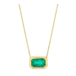 East-West Double Bezel Set Pendant with Emerald Cut Emerald in Yellow Gold, featuring a Colombian emerald gemstone in an elegant double bezel setting on a gold chain, displayed on a white background.