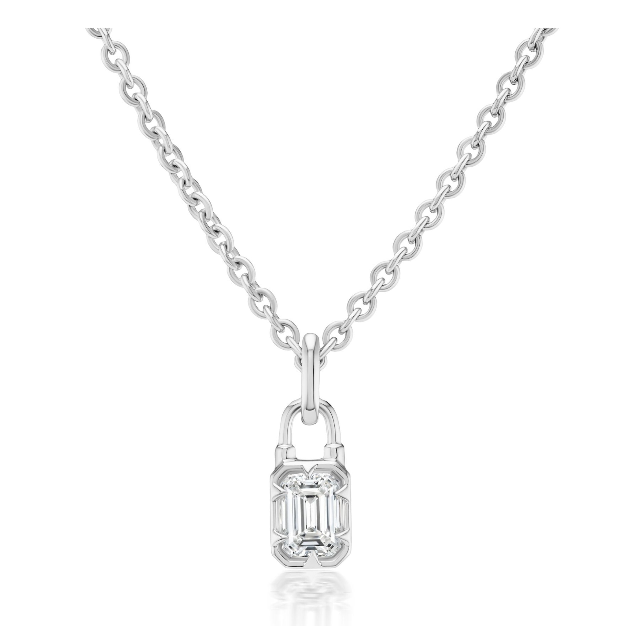 Introducing the Collet Set Locket Motif Diamond Pendant Necklace: a silver chain necklace featuring a small, emerald-cut diamond pendant designed to mimic a padlock motif, beautifully blending timeless elegance with modern design.