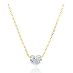 The Heart-Shaped Diamond Solitaire Pendant, crafted in 18k gold, showcases an F color SI2 clarity heart-shaped diamond and is displayed against a white background.