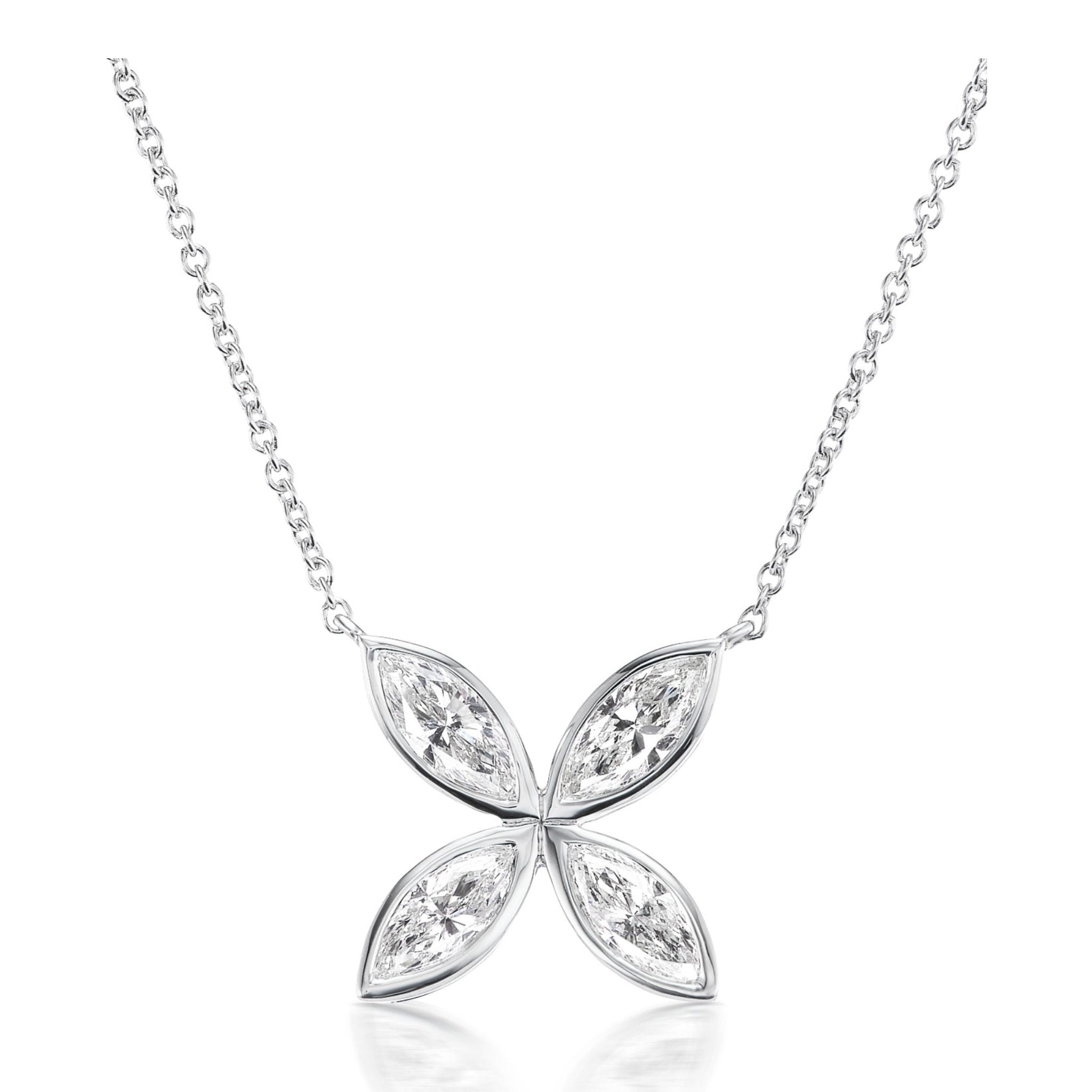Bezel Set Marquise Diamond Floral Pendant: This elegant silver necklace features a pendant crafted in the shape of a four-petal flower, each petal adorned with a sparkling marquise-cut diamond in a bezel setting, gracefully suspended from an 18-inch chain.