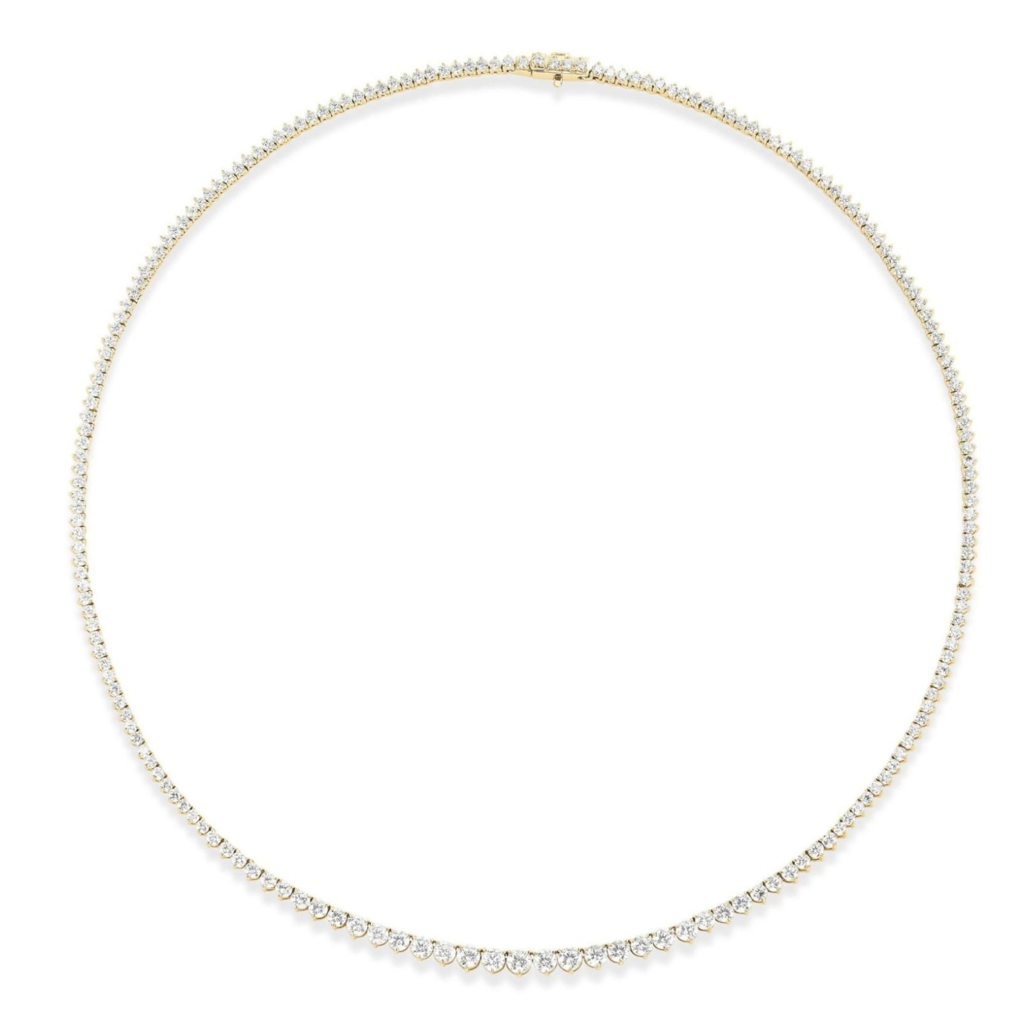 The Small Graduated Round Diamond Tennis Necklace in 18k gold showcases a full circle of petite, sparkling round diamonds that are elegantly graduated in size and evenly spaced along its entire length, beautifully displayed on a white background.