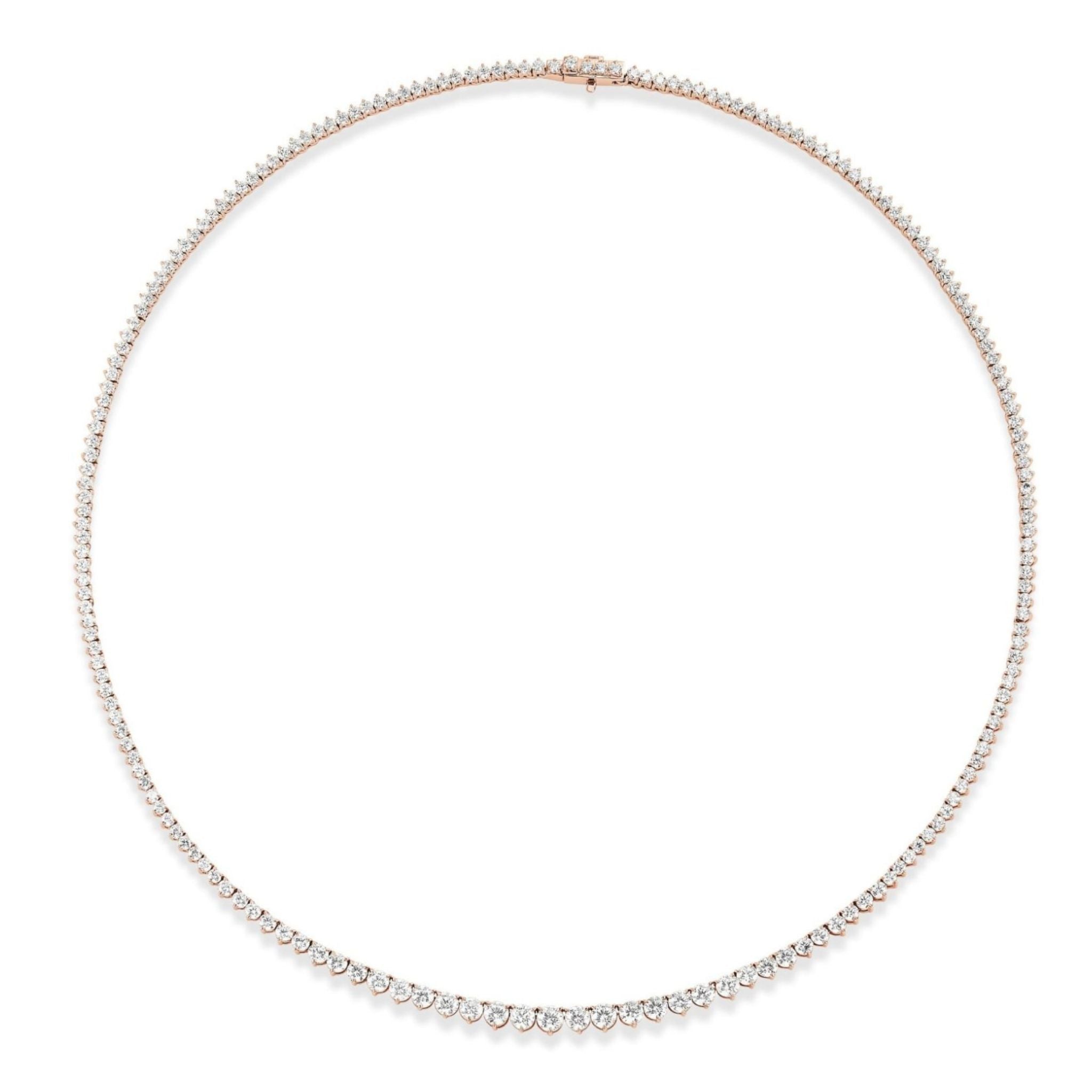 A Small Graduated Round Diamond Tennis Necklace crafted in 18k gold, featuring closely set round diamonds that gracefully graduate in size along the entire length for a full, sparkling effect.