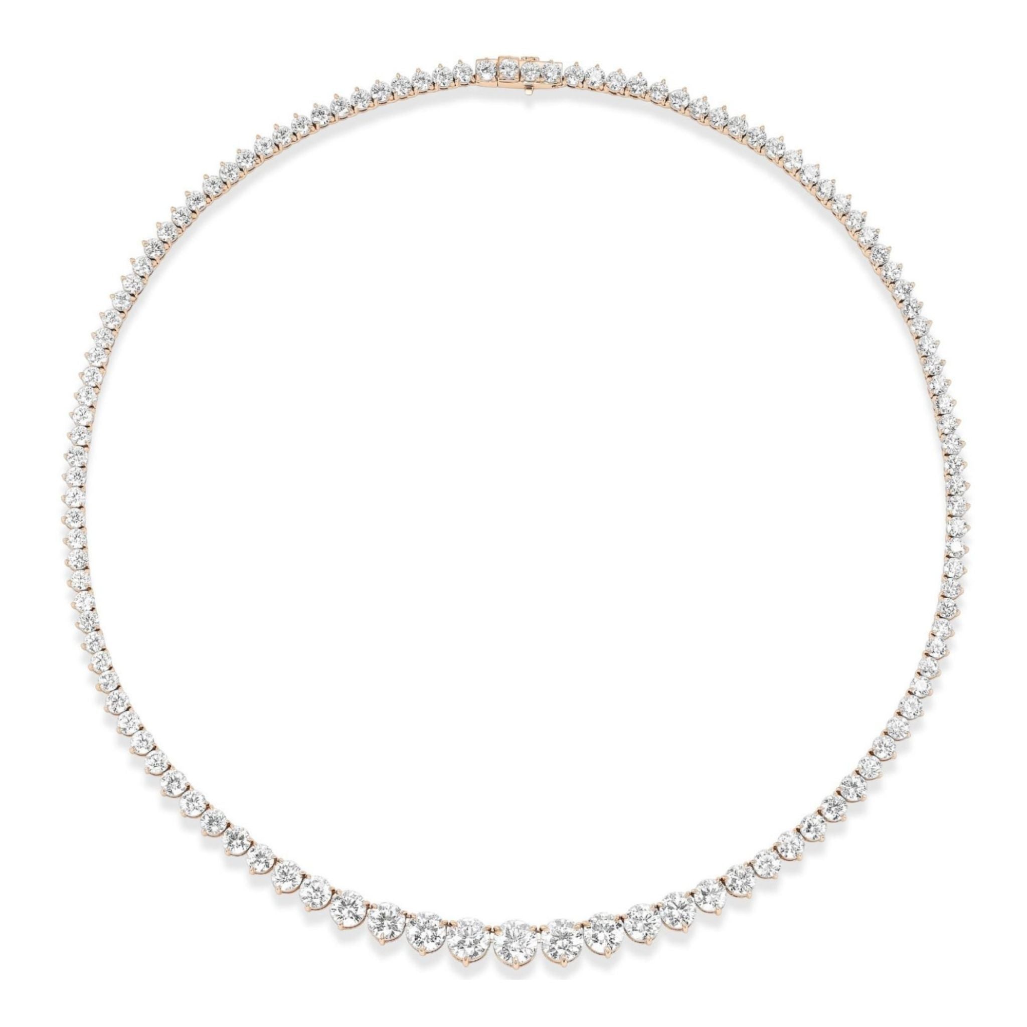 The Medium Graduated Round Diamond Tennis Necklace features a thin, delicate 18k gold chain, adorned with round diamonds in a graduated design—showcasing larger diamonds at the front and smaller ones along the sides.