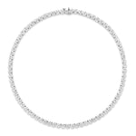 The Large Round Diamond Tennis Necklace showcases evenly spaced round diamonds set in a continuous line of 18K gold against a white background.