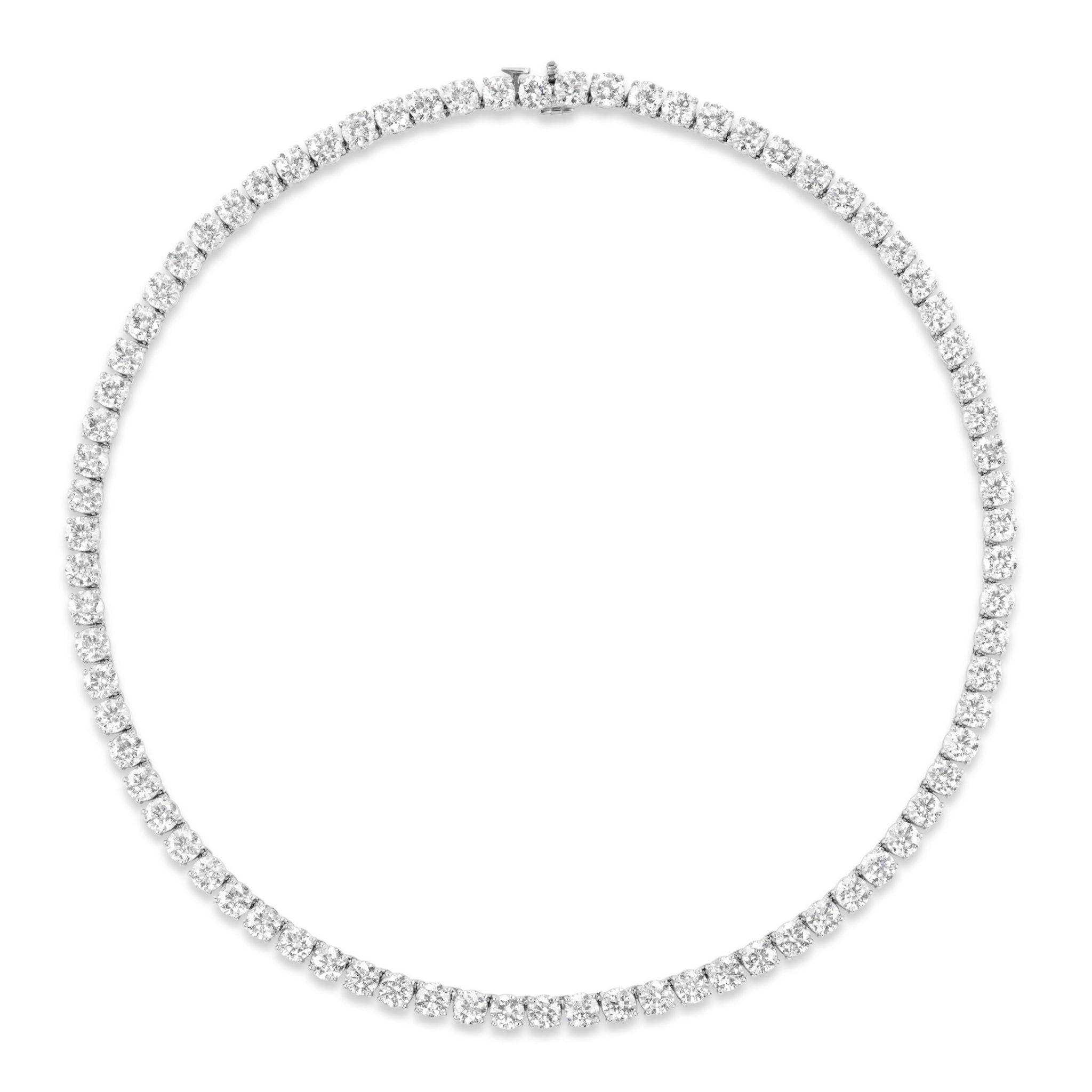 The Large Round Diamond Tennis Necklace showcases evenly spaced round diamonds set in a continuous line of 18K gold against a white background.