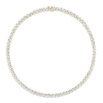 Introducing the Large Round Diamond Tennis Necklace—an exquisite 18K gold masterpiece showcasing a seamless line of closely set, brilliant round white diamonds arranged in a continuous circle.