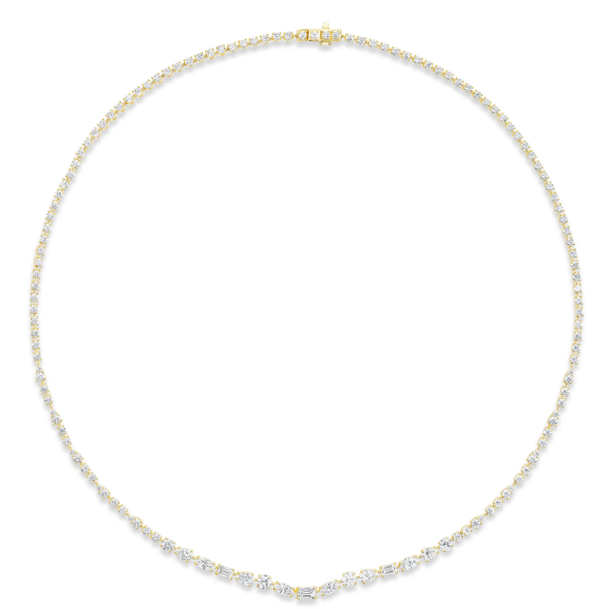 The East-West Mixed Shape Diamond Tennis Necklace in Yellow Gold features small round diamonds set closely together, with striking marquise and pear-shaped stones at the front center for a delicate, eye-catching look.