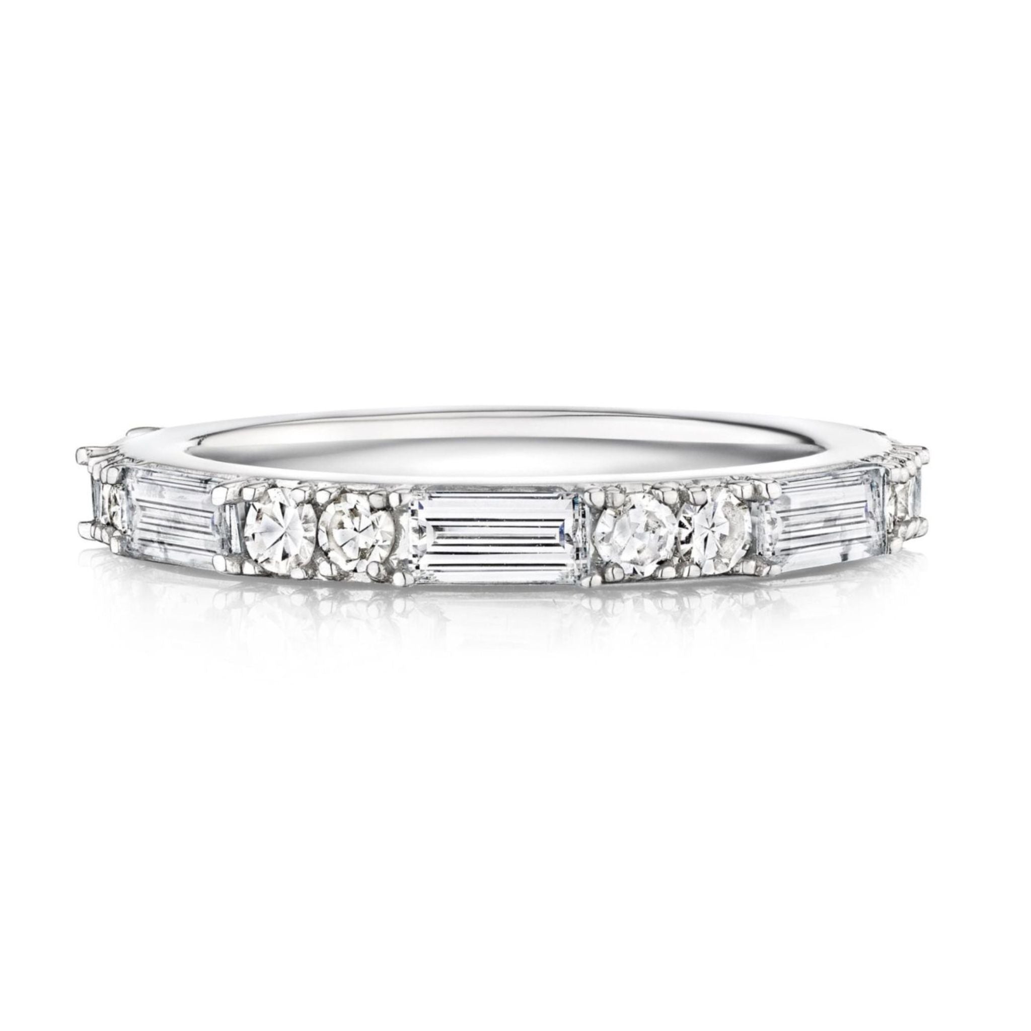 The East-West Set Baguette and Round Diamond Eternity Band is crafted in 18K white gold, featuring alternating round and baguette diamonds in a single row around the band.