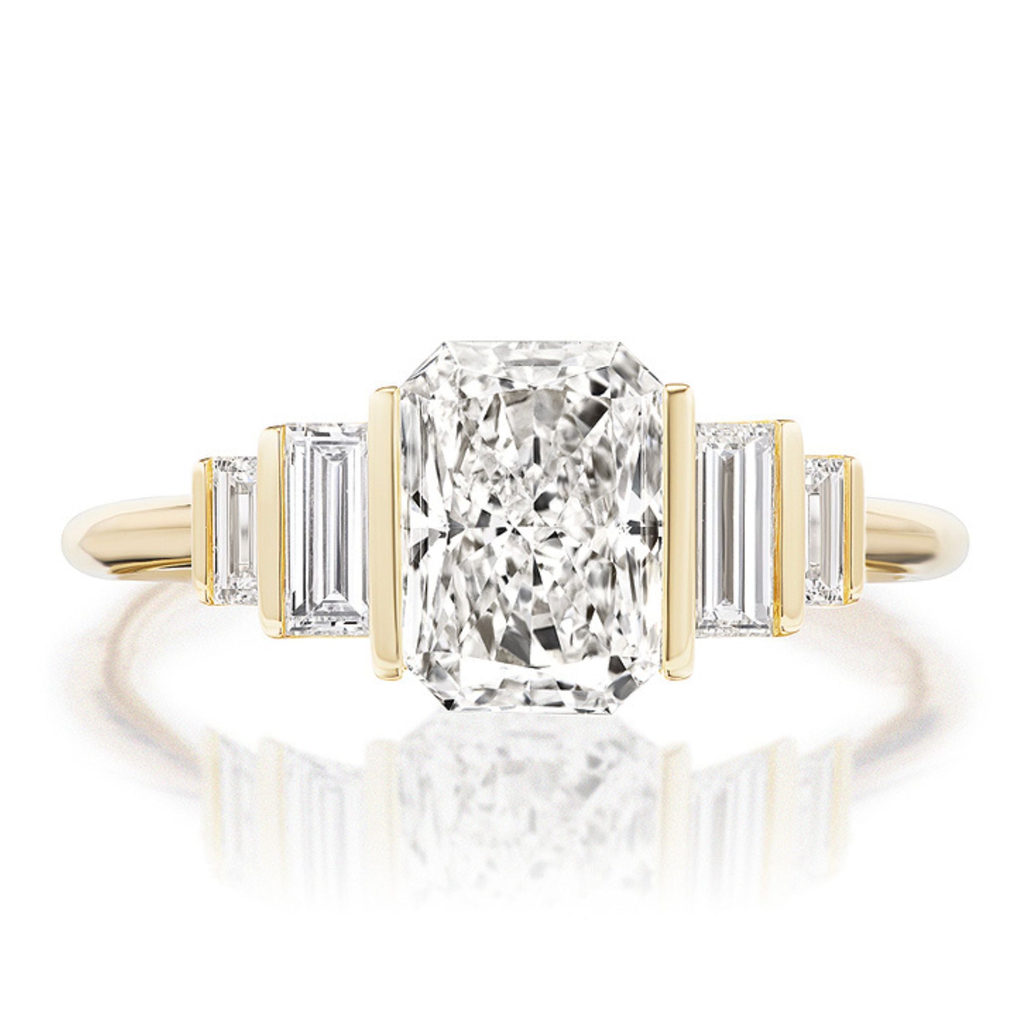 The Echo Emerald Cut Diamond Engagement Ring showcases a striking emerald-cut diamond accented by baguette diamonds, offering a symmetrical and modern design—ideal for those seeking stunning contemporary bridal rings.