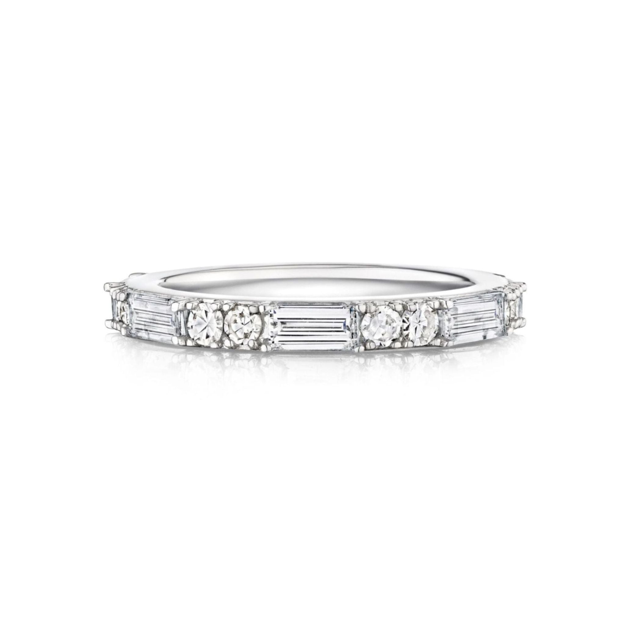 The East-West Set Baguette and Round Diamond Eternity Band features alternating round diamonds and baguette-cut diamonds in a continuous pattern set in white gold or platinum.