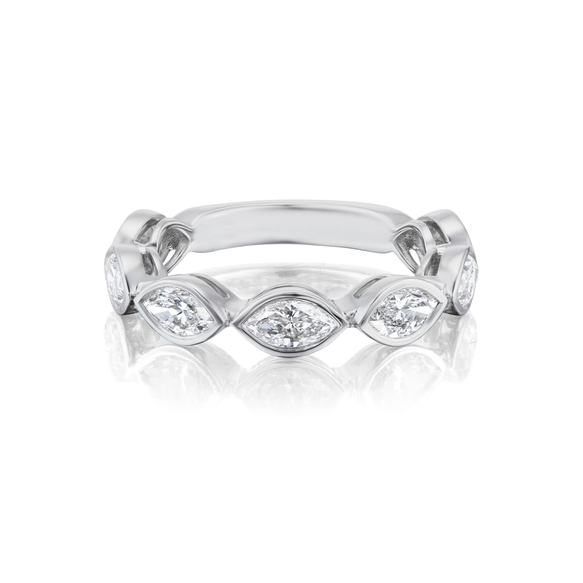 Introducing the Chasing Marquise Bezel Set Diamond Half Eternity Band: a silver ring featuring alternating marquise-shaped diamonds and round-cut clear gemstones, each expertly set in sleek bezel settings and beautifully showcased on a white reflective surface—an ideal choice for those in search of an elegant bridal ring or a stunning celebration band.