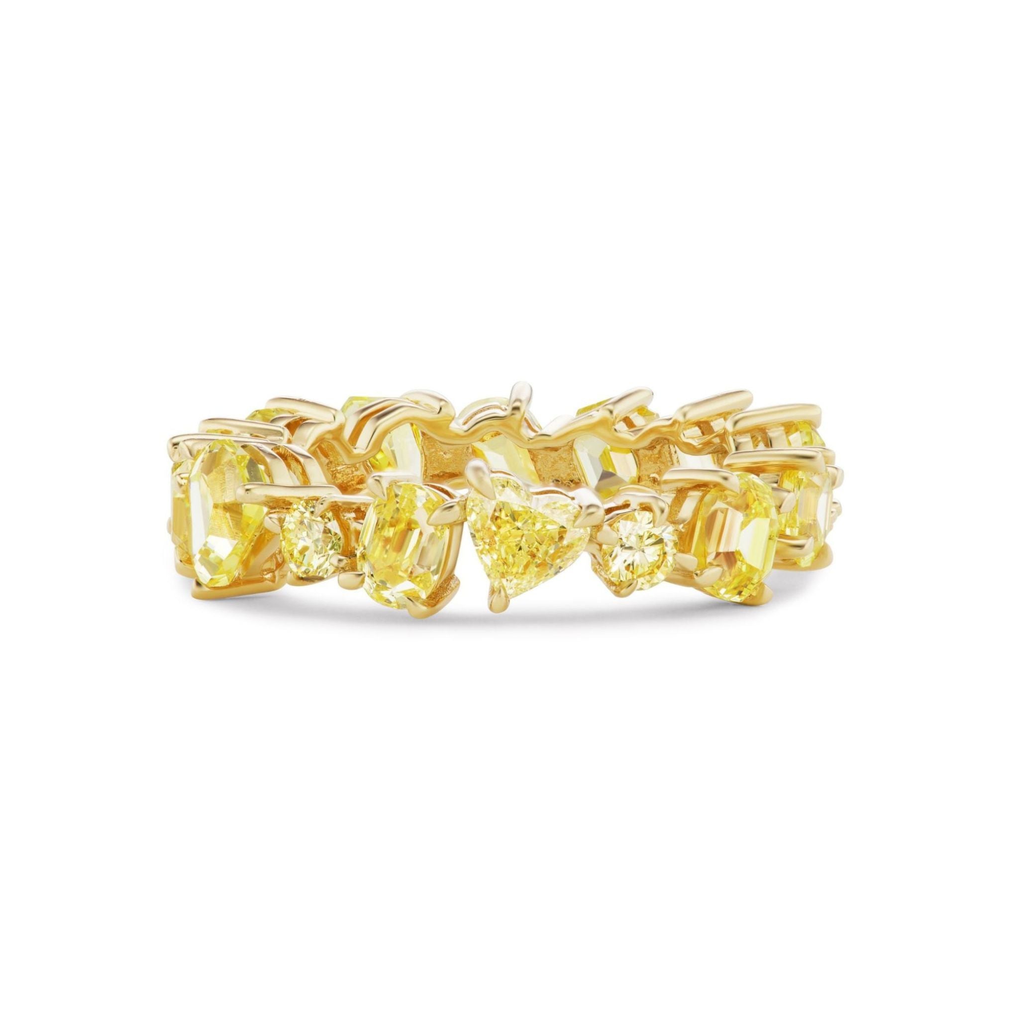 The Mixed Shape Eternity Band in Yellow Gold with Yellow Diamonds features an array of yellow diamonds in various shapes set in a seamless 18k yellow gold band, offering a vibrant and elegant design.