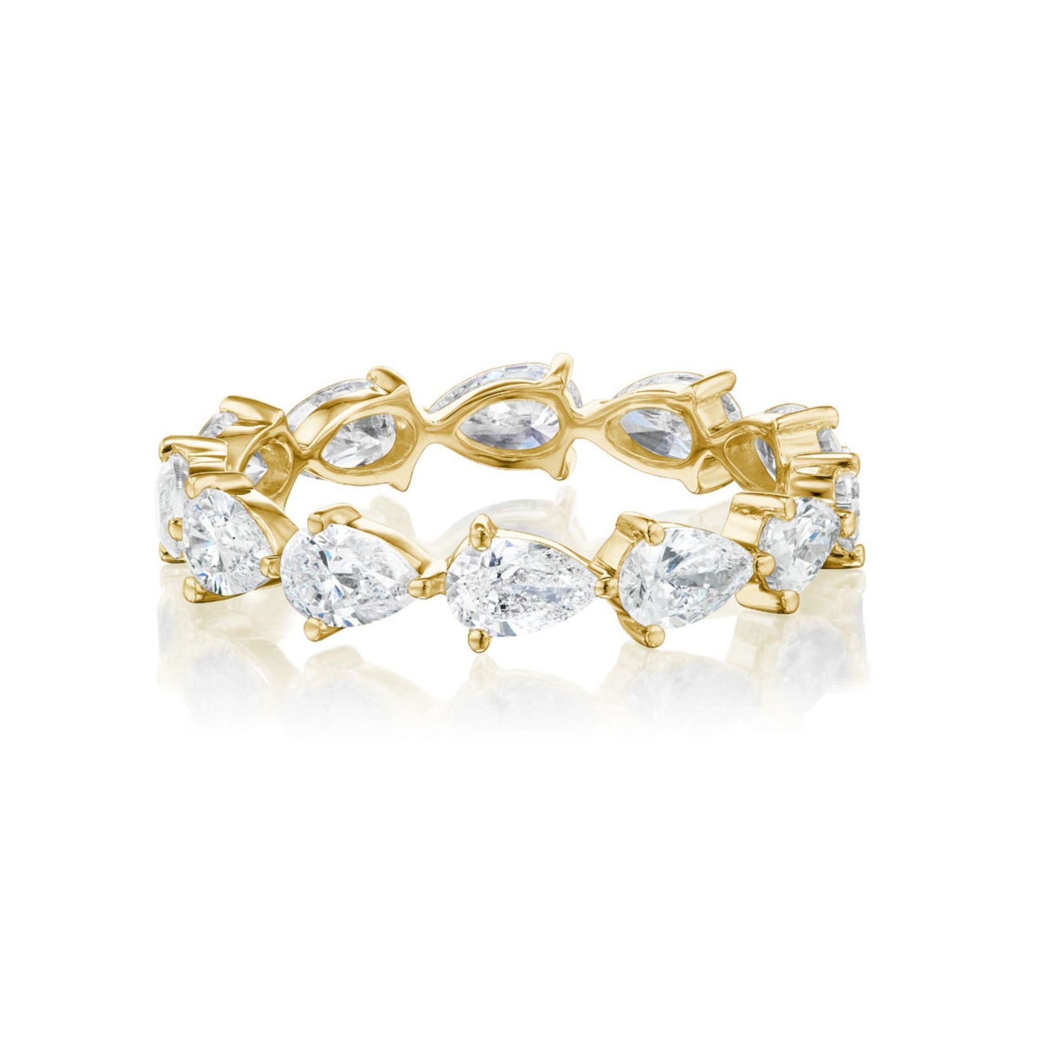 Introducing the Chasing Pears Eternity Band: a stunning 18k gold ring showcasing alternating pear-shaped diamonds and marquise-cut clear gemstones set in an endless band. Available in size 6.