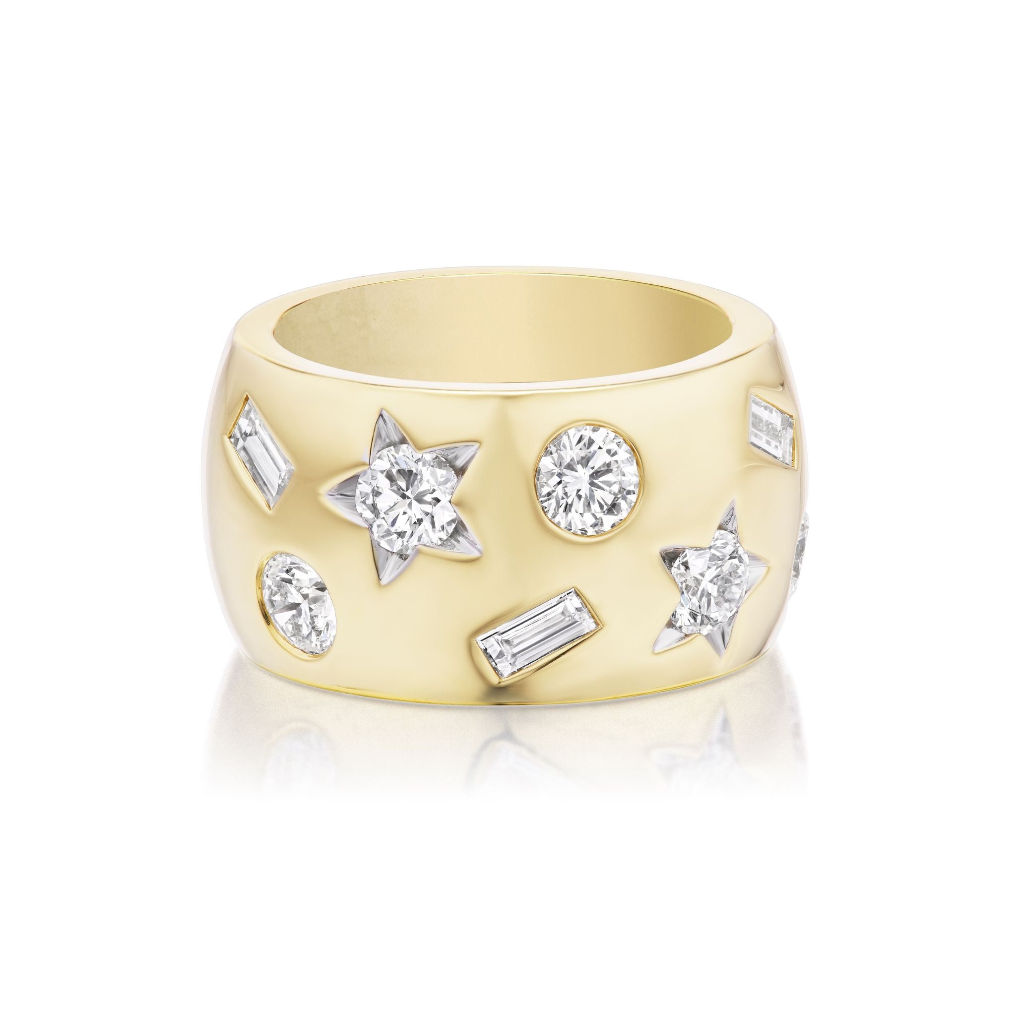 The Large Celestial Cigar Band in Yellow Gold with Mixed Shape Diamonds features a wide 18k yellow gold band adorned with both star-shaped and rectangular diamond accents. Part of our Celestial Collection, this ring blends sleek gold with shimmering gemstones for a bold, modern take on diamond jewelry.