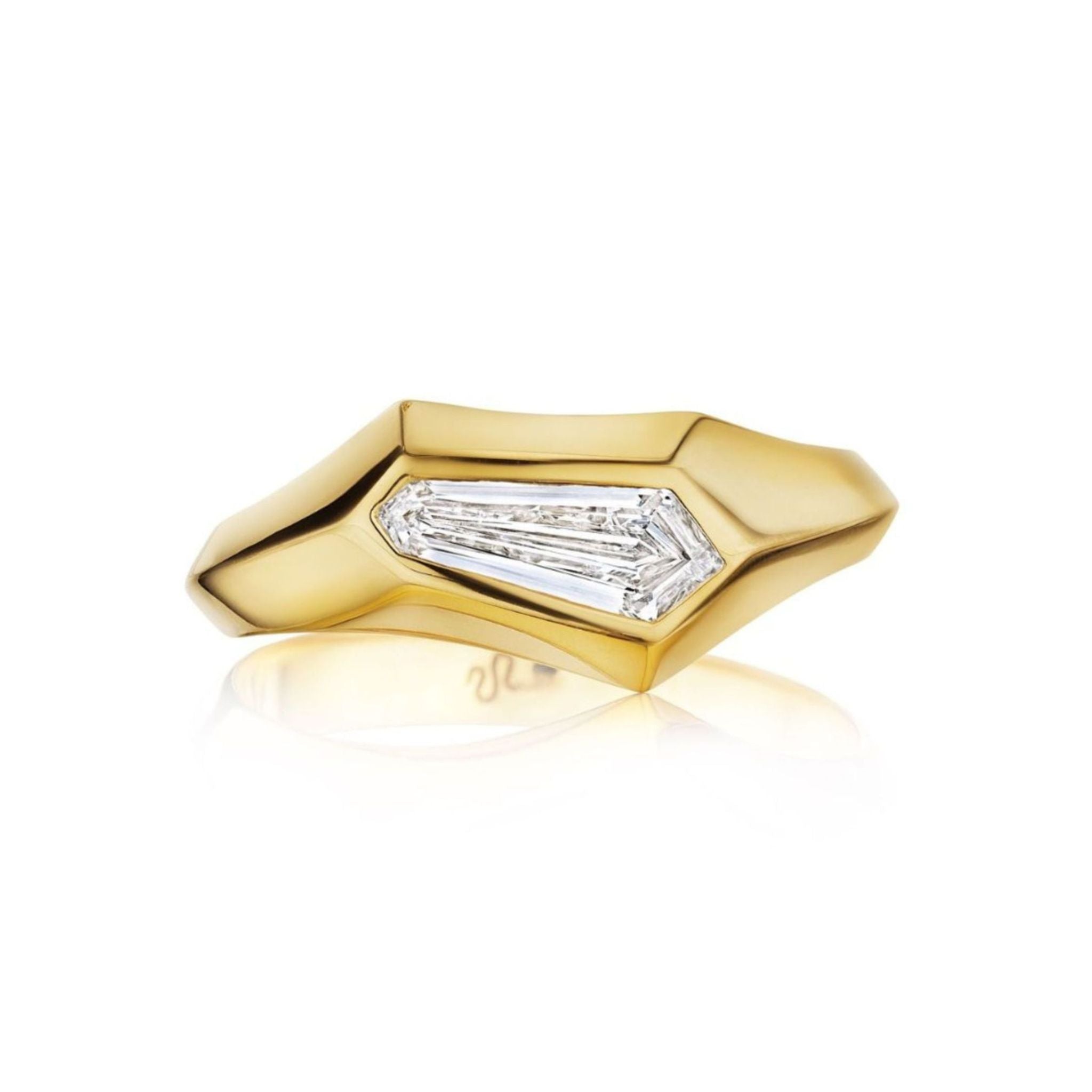 Discover the Geometric Burnish Set Ring in Yellow Gold, featuring a distinctive shield cut diamond set at an angle in the center. This bold and contemporary piece is ideal for those who appreciate unique, custom jewelry with modern geometric flair.
