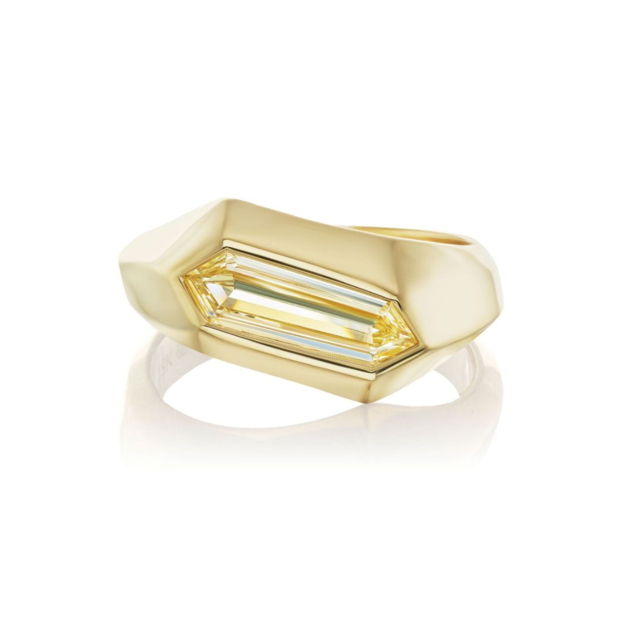 The Chunky Hexagonal Ring in Yellow Gold features a fancy light yellow diamond, prominently set in a modern, angular 18k yellow gold bezel.