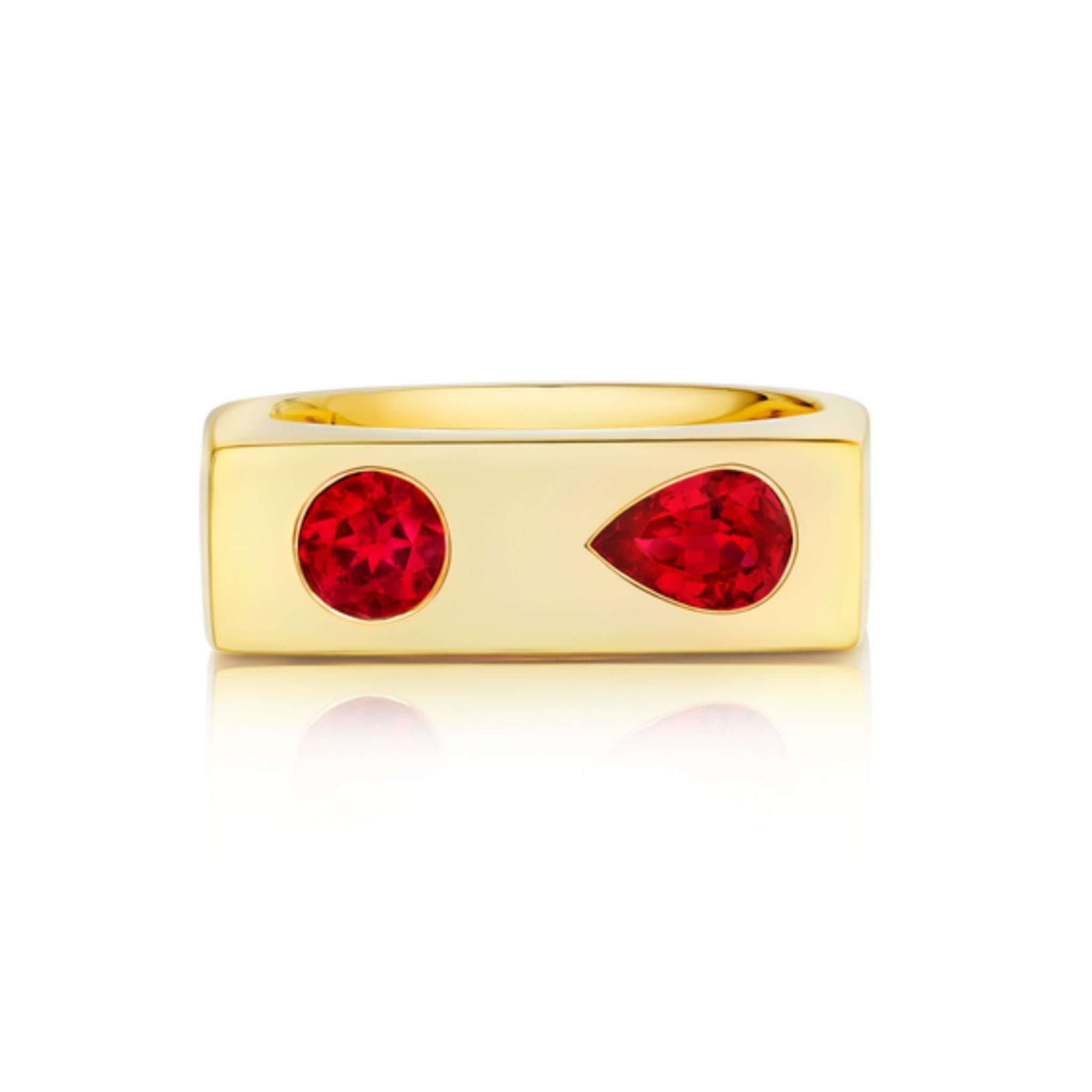 Introducing the Mixed Shape Ruby Bar Ring in Yellow Gold—a rectangular yellow gold band showcasing two striking red rubies, one round and one teardrop-shaped, set side by side on its flat surface. Presented against a white background, this modern design is ideal for those seeking a fresh take on a ruby ring or customizable jewelry options.