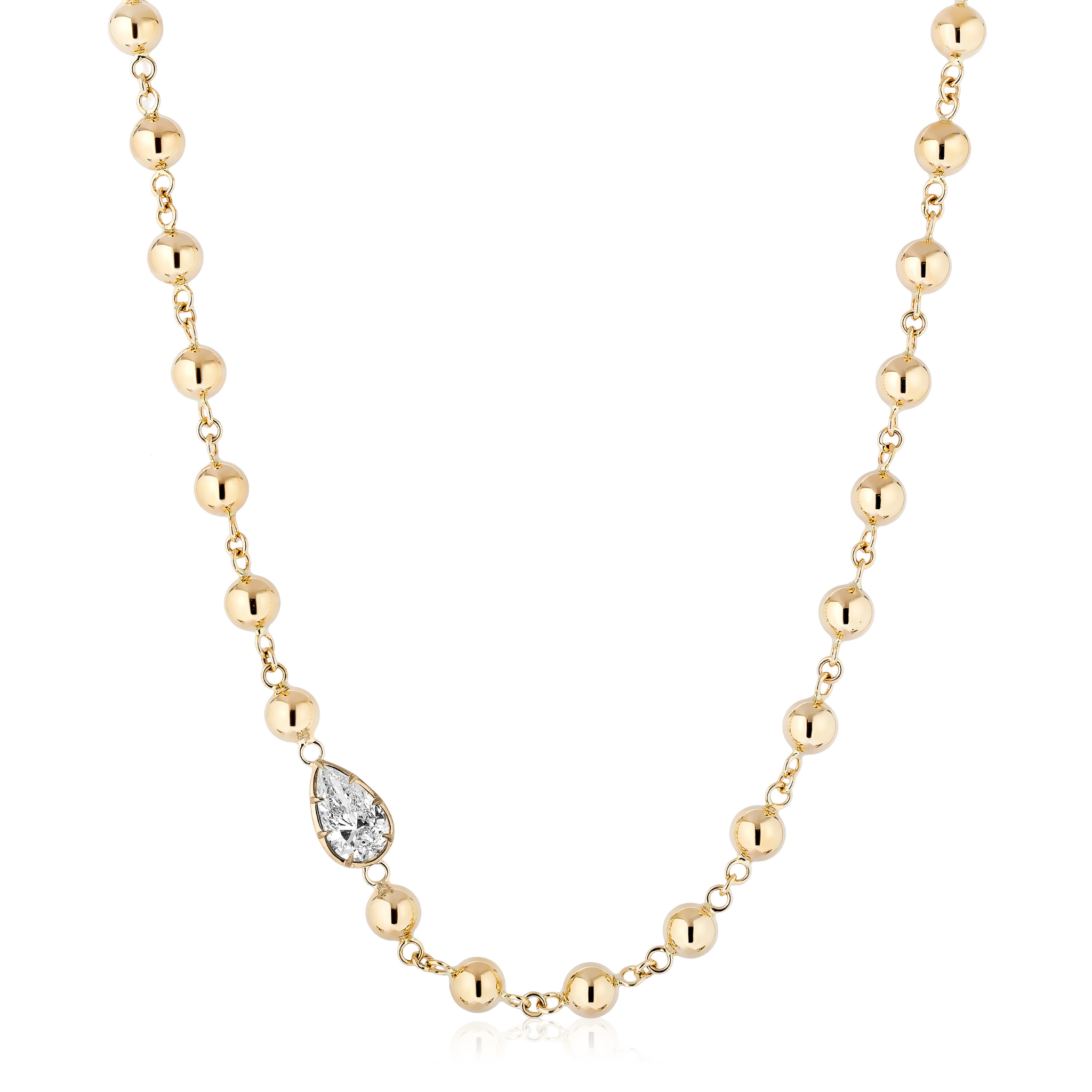 The Garland Chain Necklace in Yellow Gold features evenly spaced round gold beads and an east-west set pear diamond pendant in a silver mount, all elegantly strung on an 18K yellow gold chain.