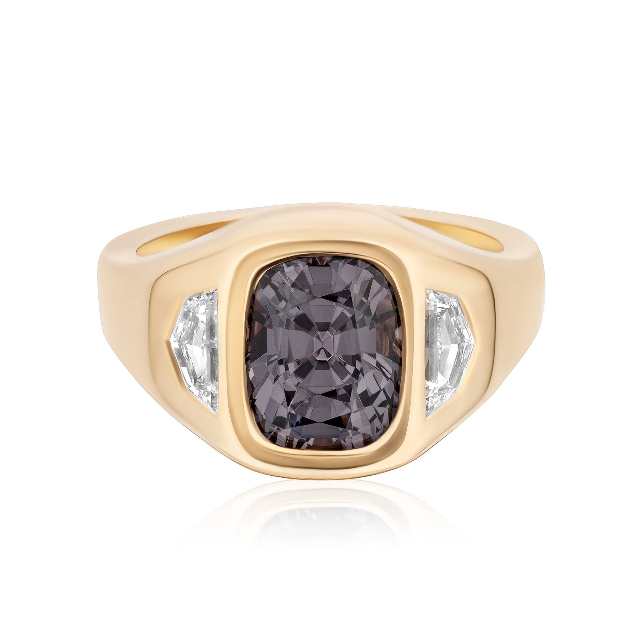 The Cushion Cut Spinel and Diamond Epaulette Side Stone Gypsy Ring in Yellow Gold features a striking cushion cut spinel center and diamond epaulette side stones set elegantly in an 18K yellow gold band.