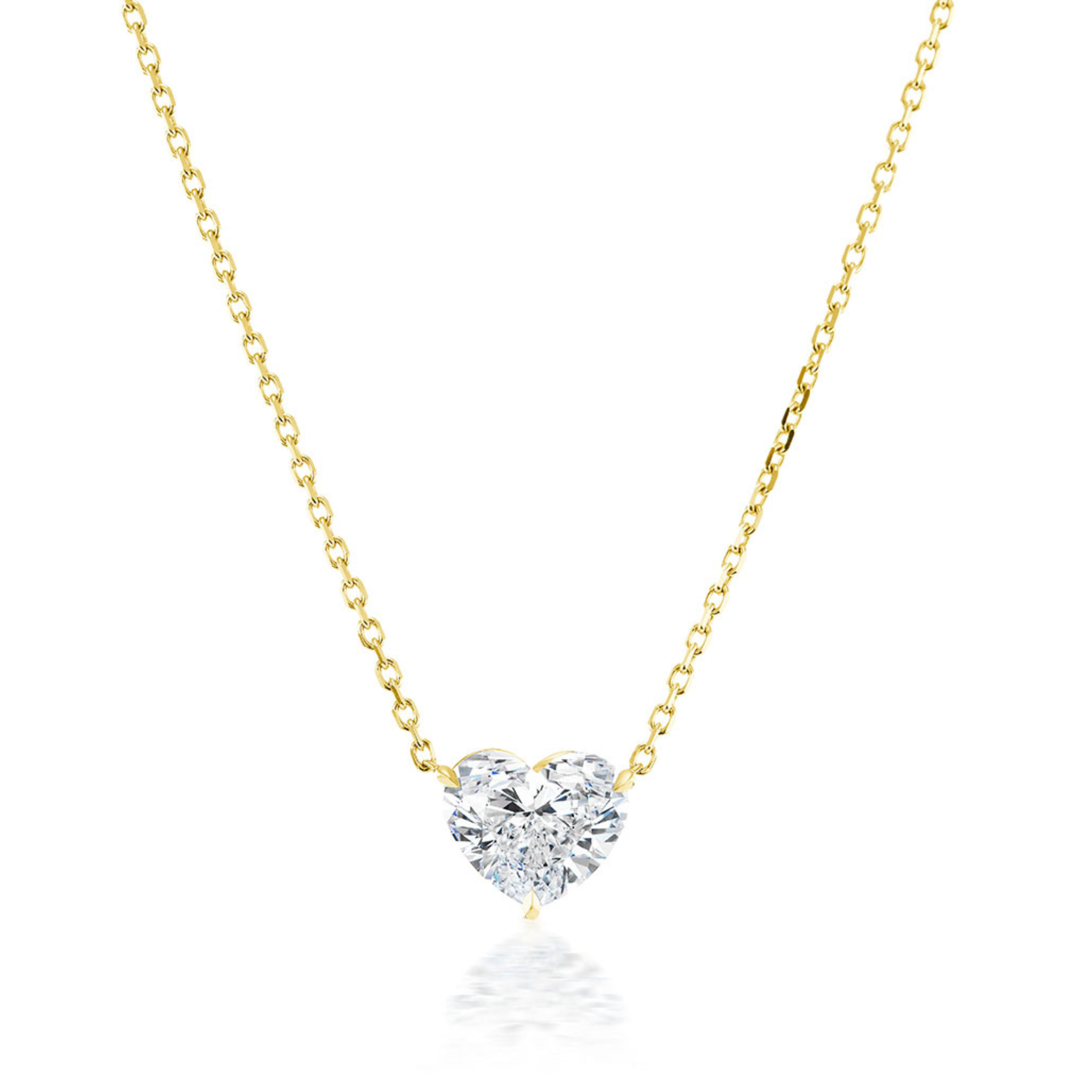 The Heart Diamond Solitaire Pendant is a stunning 18K gold necklace featuring a heart-shaped diamond solitaire, beautifully showcased on a white background.
