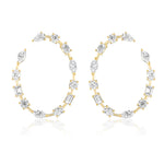 The Light Mixed Shape Diamond Hoops feature G-H color oval, marquise, round, and emerald cut diamonds evenly set along 18K gold hoops, displayed on a white background.