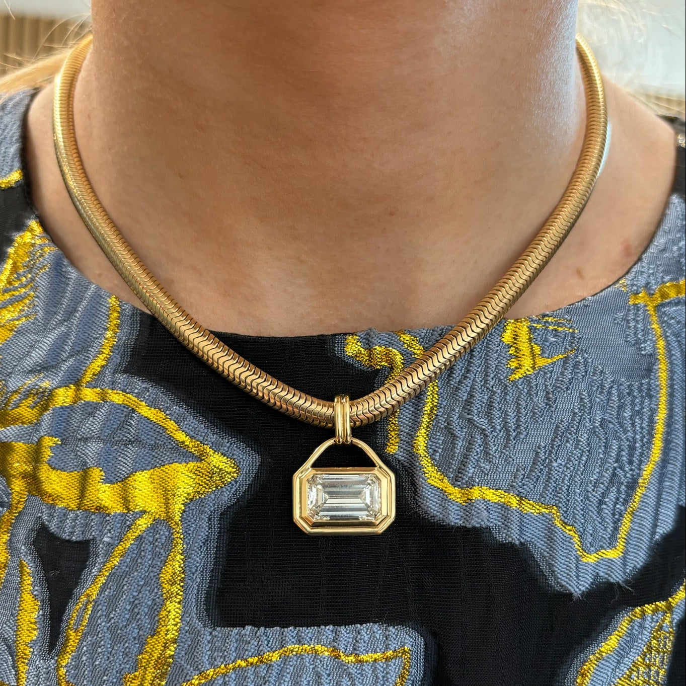 East-West Bezel Set Emerald Cut Diamond Pendant Necklace in Yellow Gold