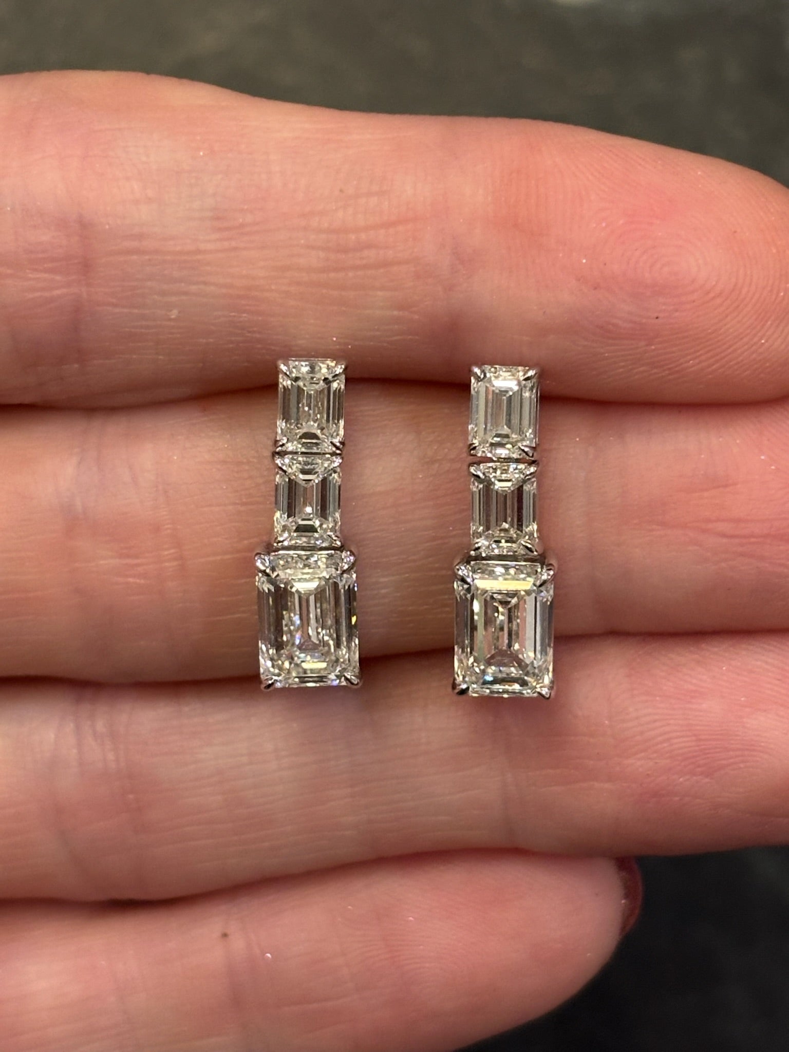 Graduated Emerald Cut Diamond Drop Earrings in White Gold