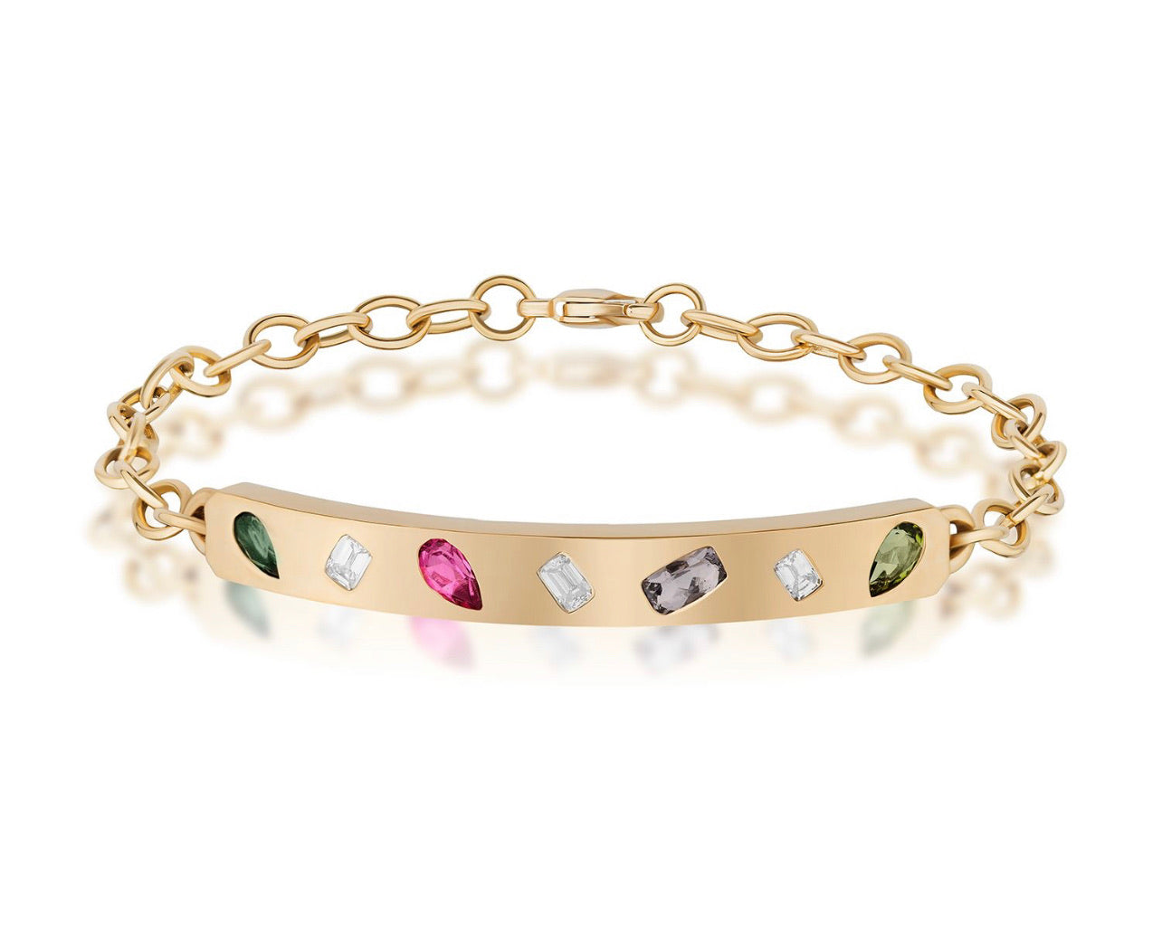 The Sapphire and Diamond ID Bracelet in Yellow Gold features a flat bar with emerald-cut diamonds and pear-shaped sapphires in green, pink, clear, and purple tones, all beautifully spaced on an 18K yellow gold chain.