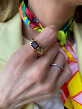 Bombé Ring with East-West Set Emerald Cut Ruby in Yellow Gold