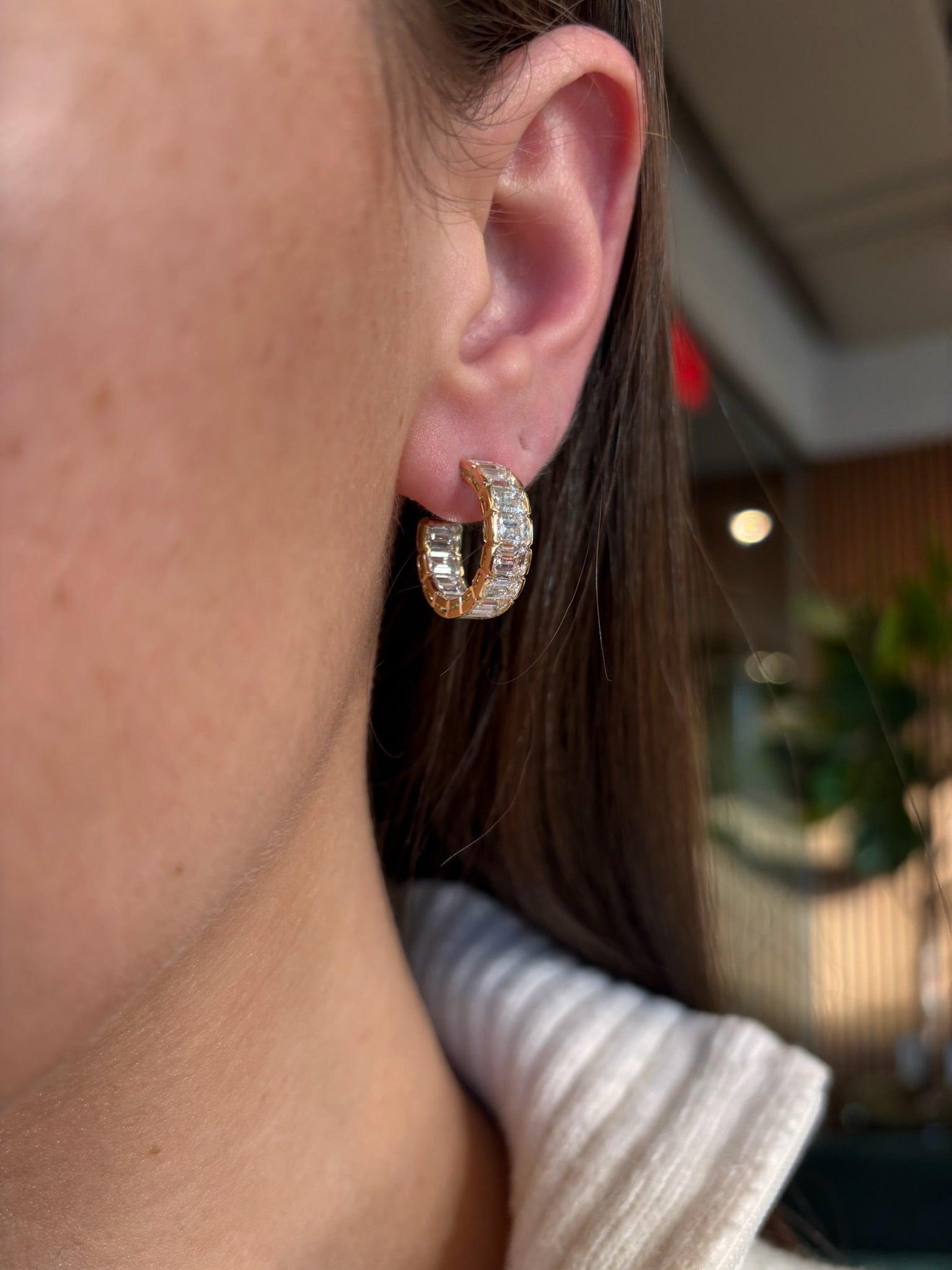 East-West Half-Bezel Set Emerald Cut Diamond Hoops in Yellow Gold