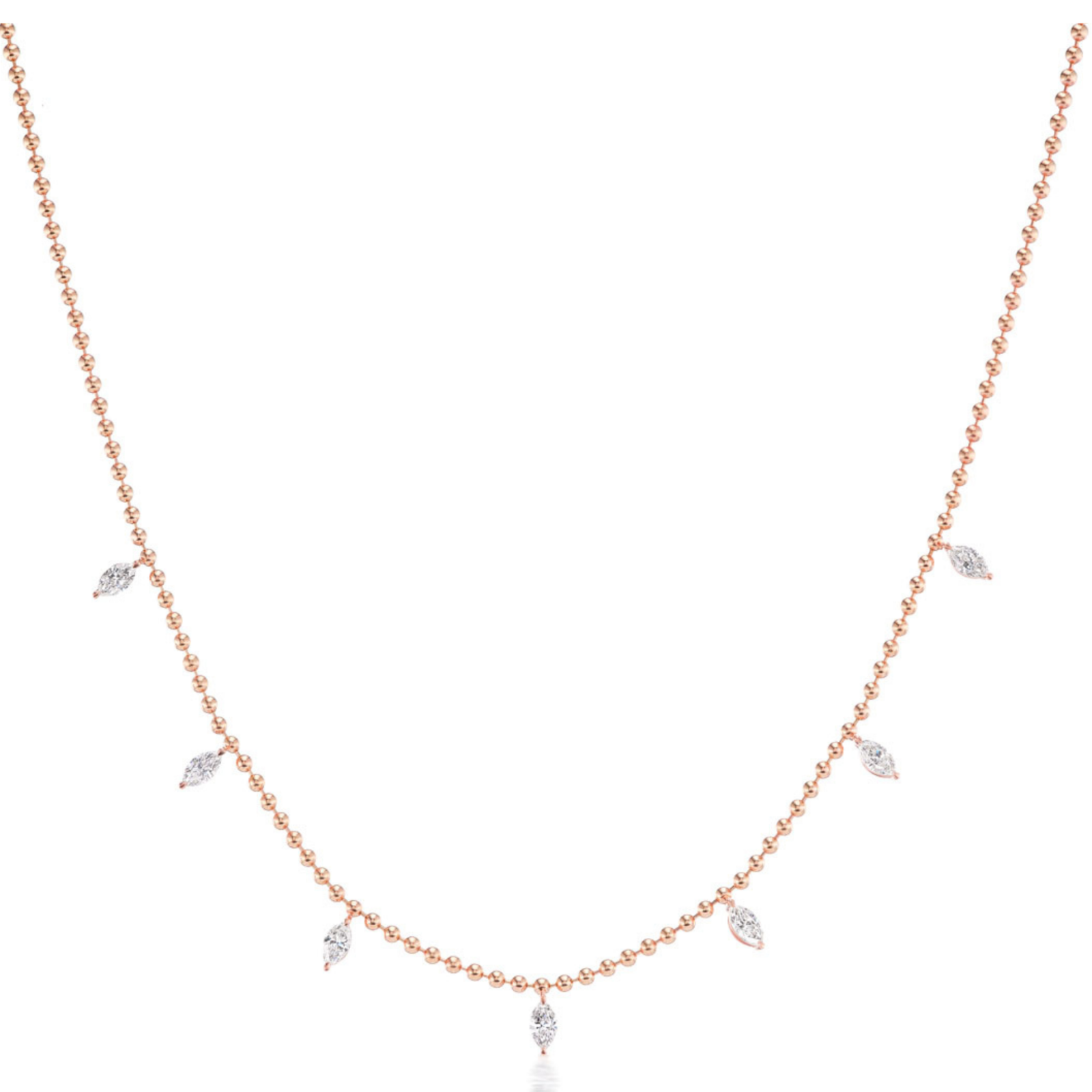 The Spike Ball Chain Necklace with Marquise Diamonds features an 18k gold beaded chain adorned with seven evenly spaced marquise-shaped clear gemstones in a symmetrical design.